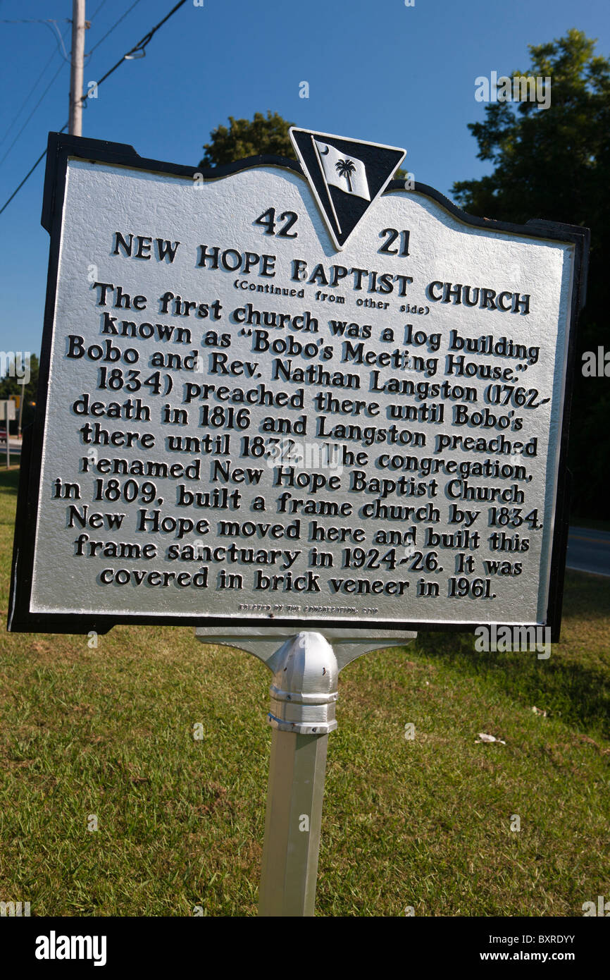 NEW HOPE BAPTIST CHURCH (Continued from other side) The first church was a log building known as “Bobo’s Meeting House.” Stock Photo