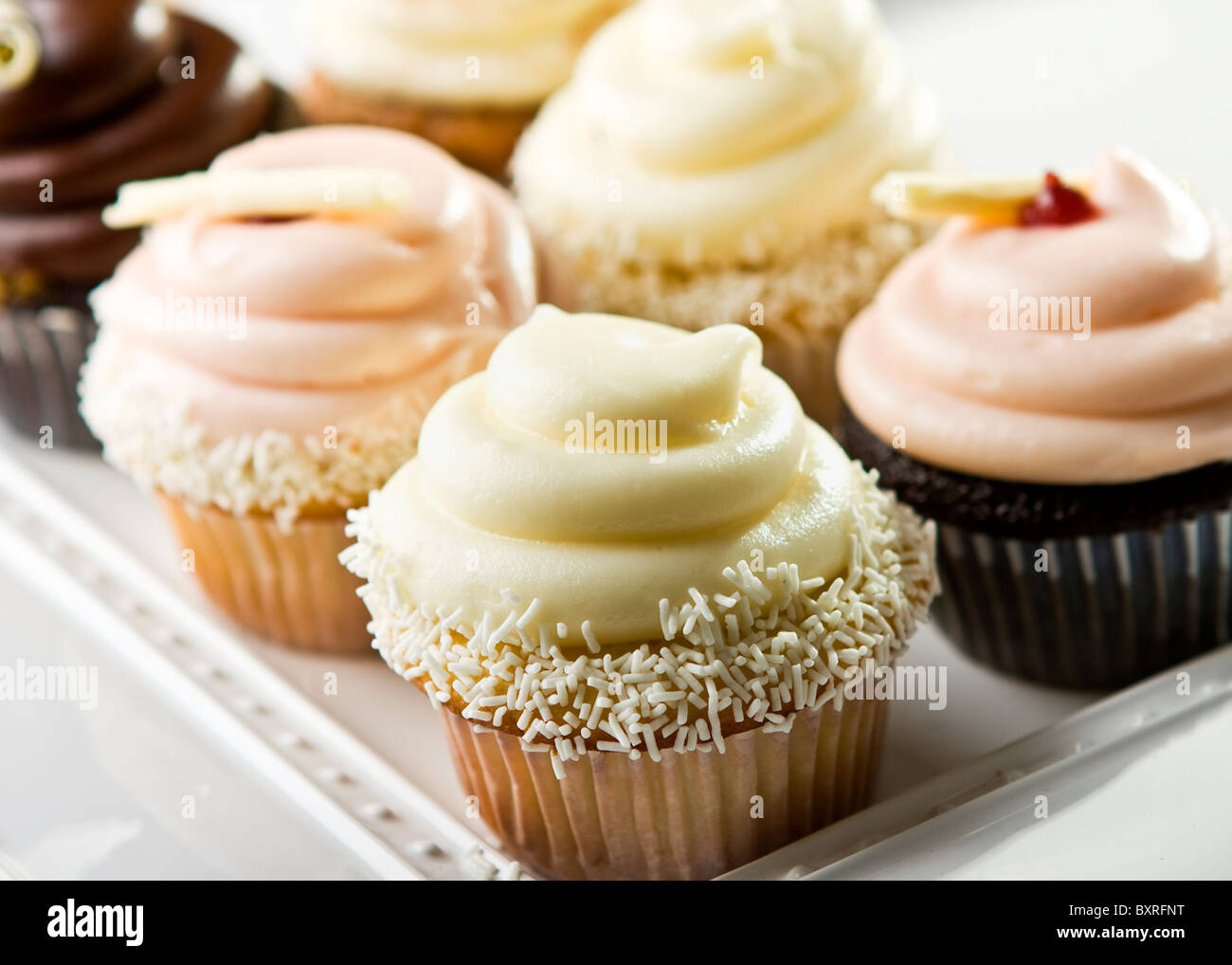 six cupcakes with icing Stock Photo Alamy