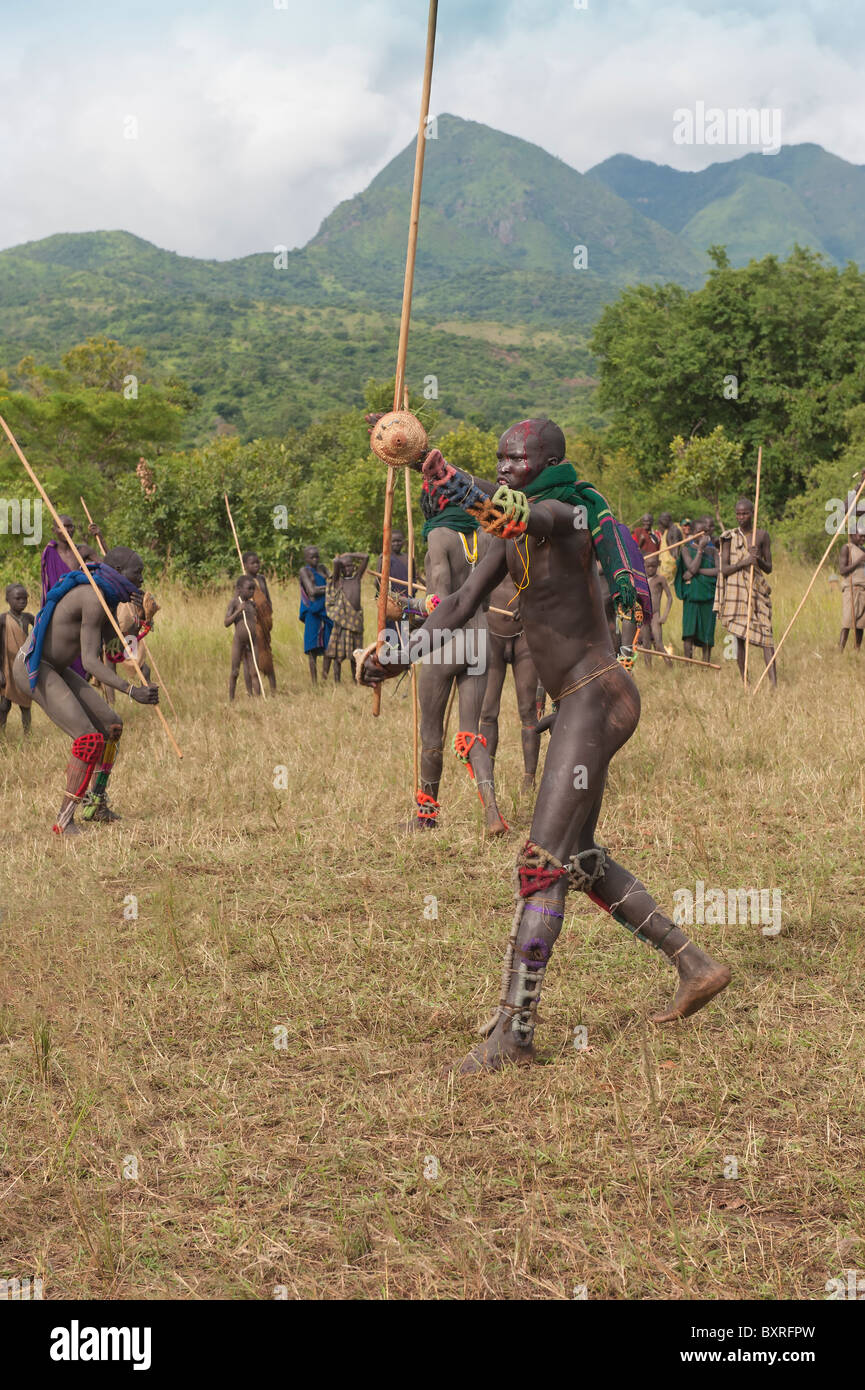 Donga stick fighter, Surma tribe, Tulgit, Omo river valley, Ethiopia Africa Stock Photo