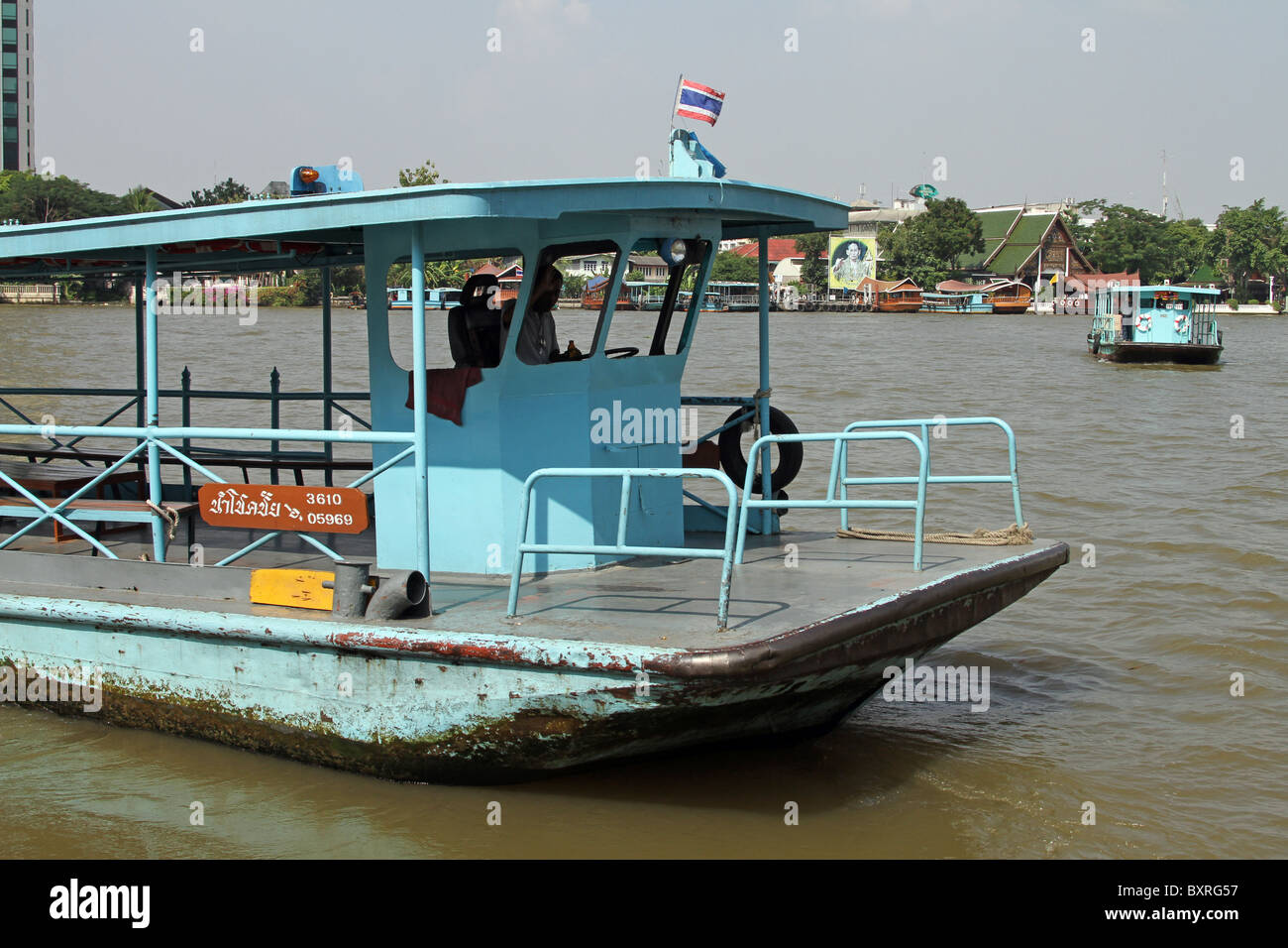A traditional ferry boat on the Chao Phraya River in Bangkok, Thailand Stock Photo