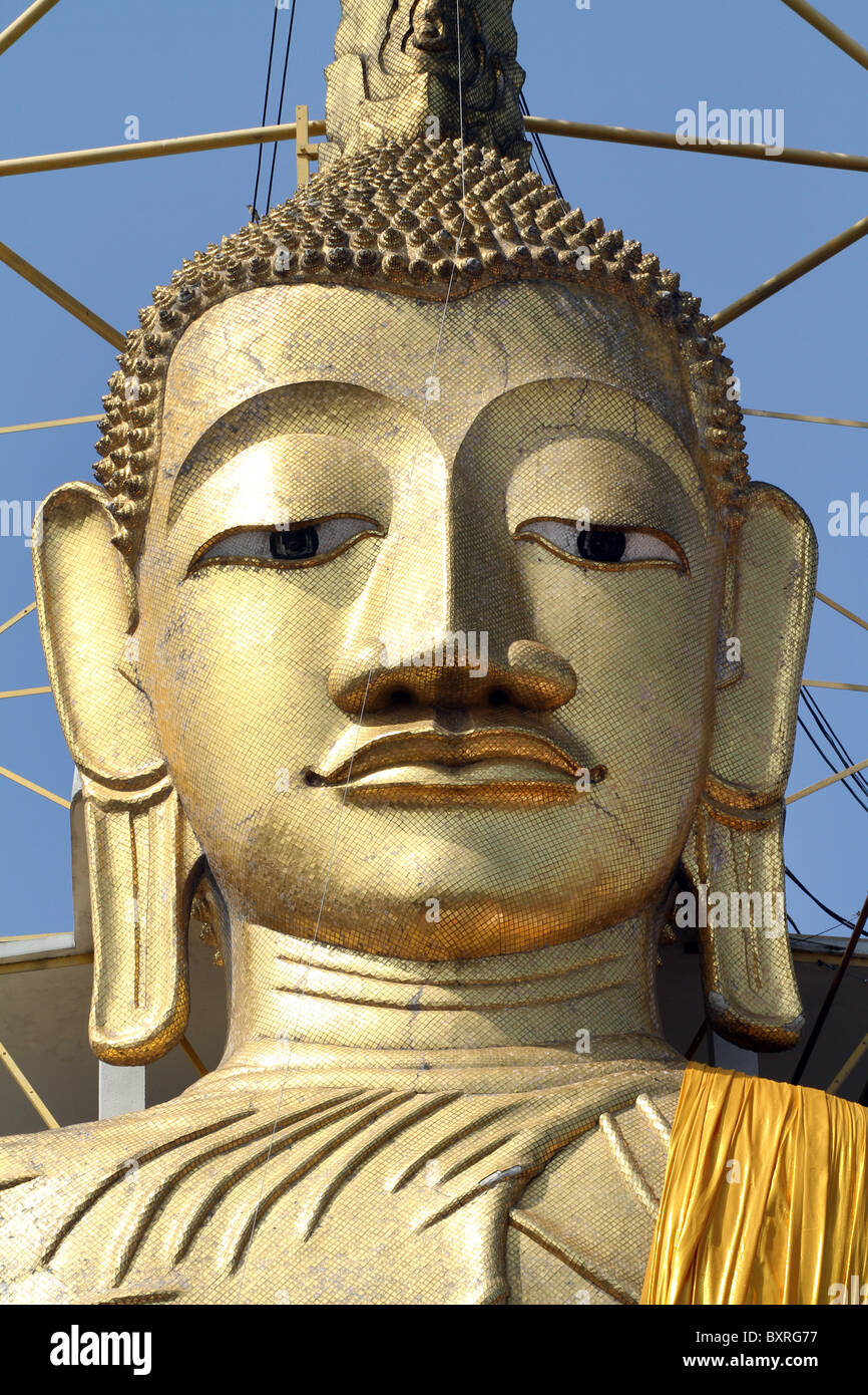 Golden buddha statue at Wat Intharawihan, the tallest standing buddha