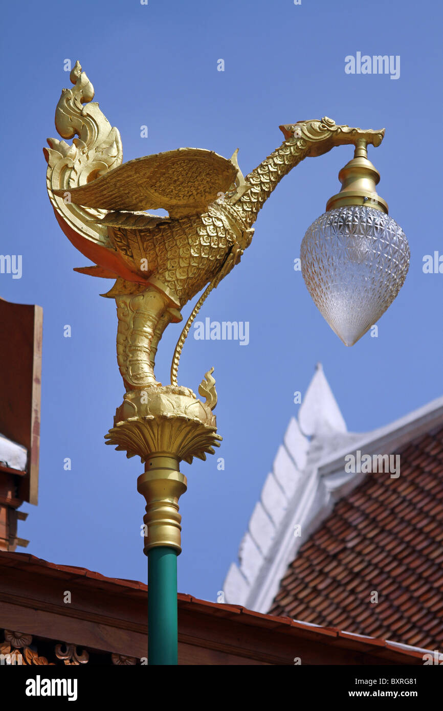 Golden bird statue at Wat Intharawihan temple in Bangkok, Thailand Stock Photo