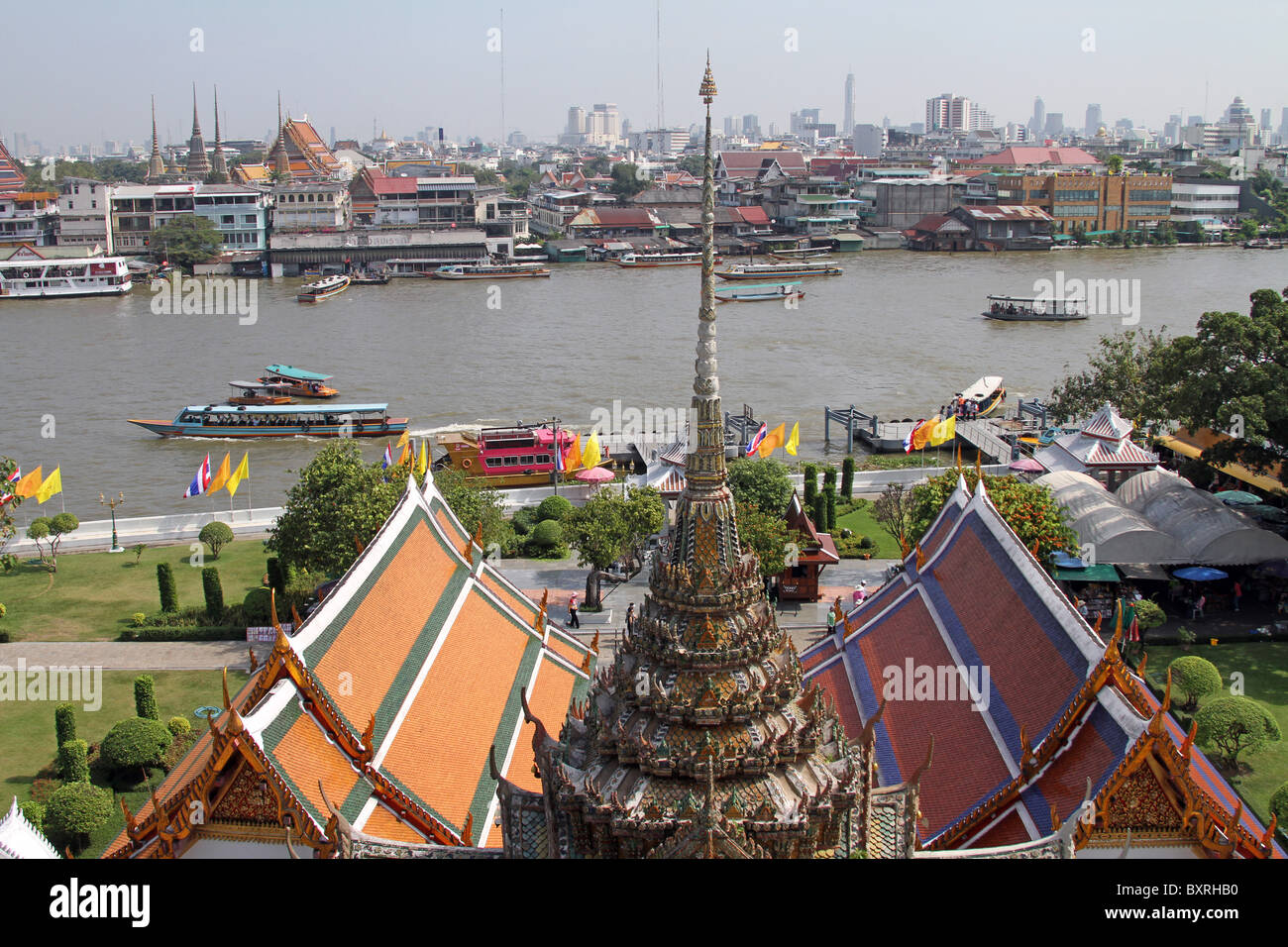 Boats and river traffic on the Chao Phraya River in Bangkok, Thailand ...