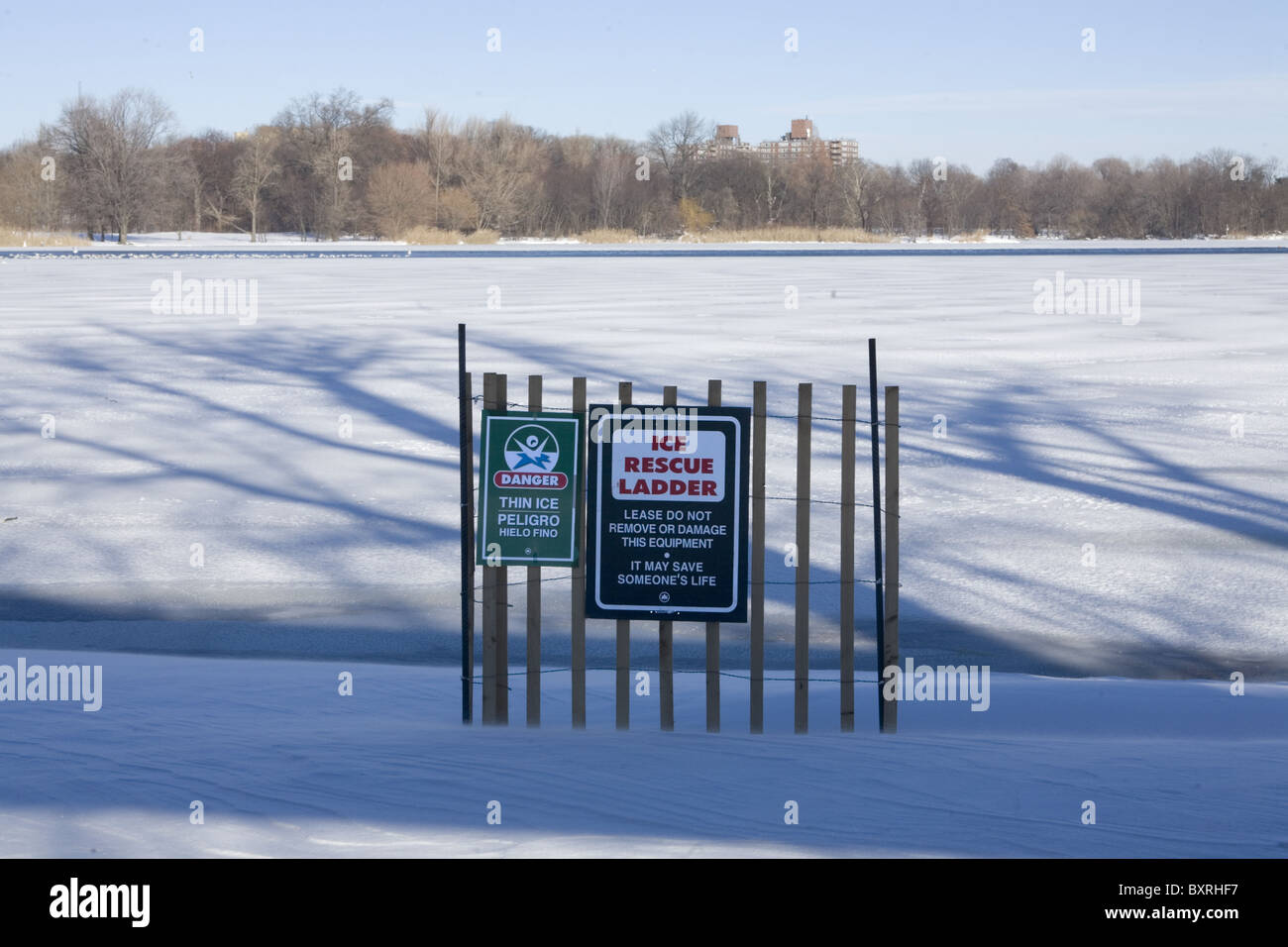 Frozen lake in Prospect Park, Brooklyn, New York with the warning thin