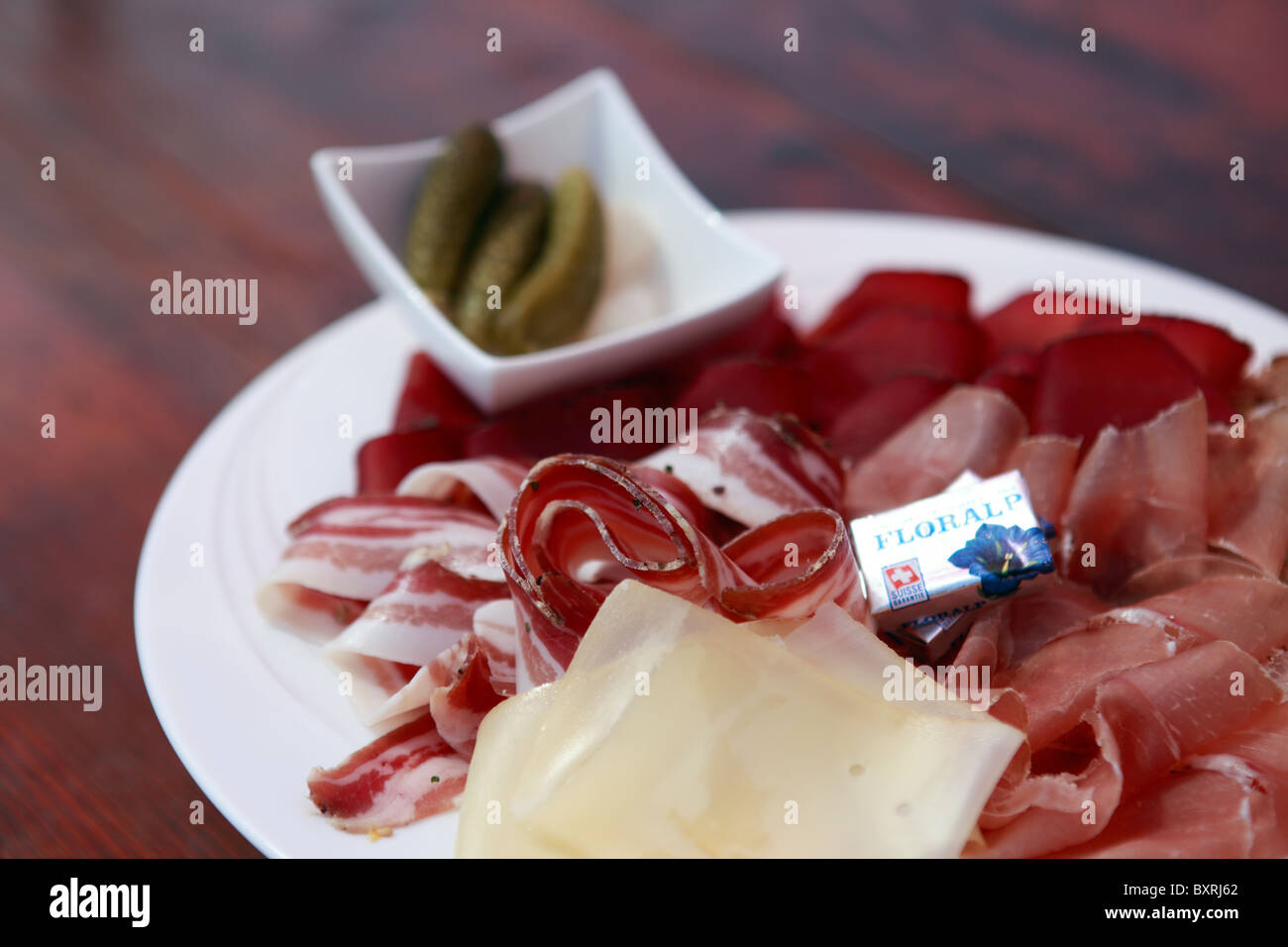 A typical plate of Valais meat and cheese (L´assiette valaisanne) Beef,  ham, bacon, cheese and rye bread. Vercorin, Switzerland Stock Photo - Alamy