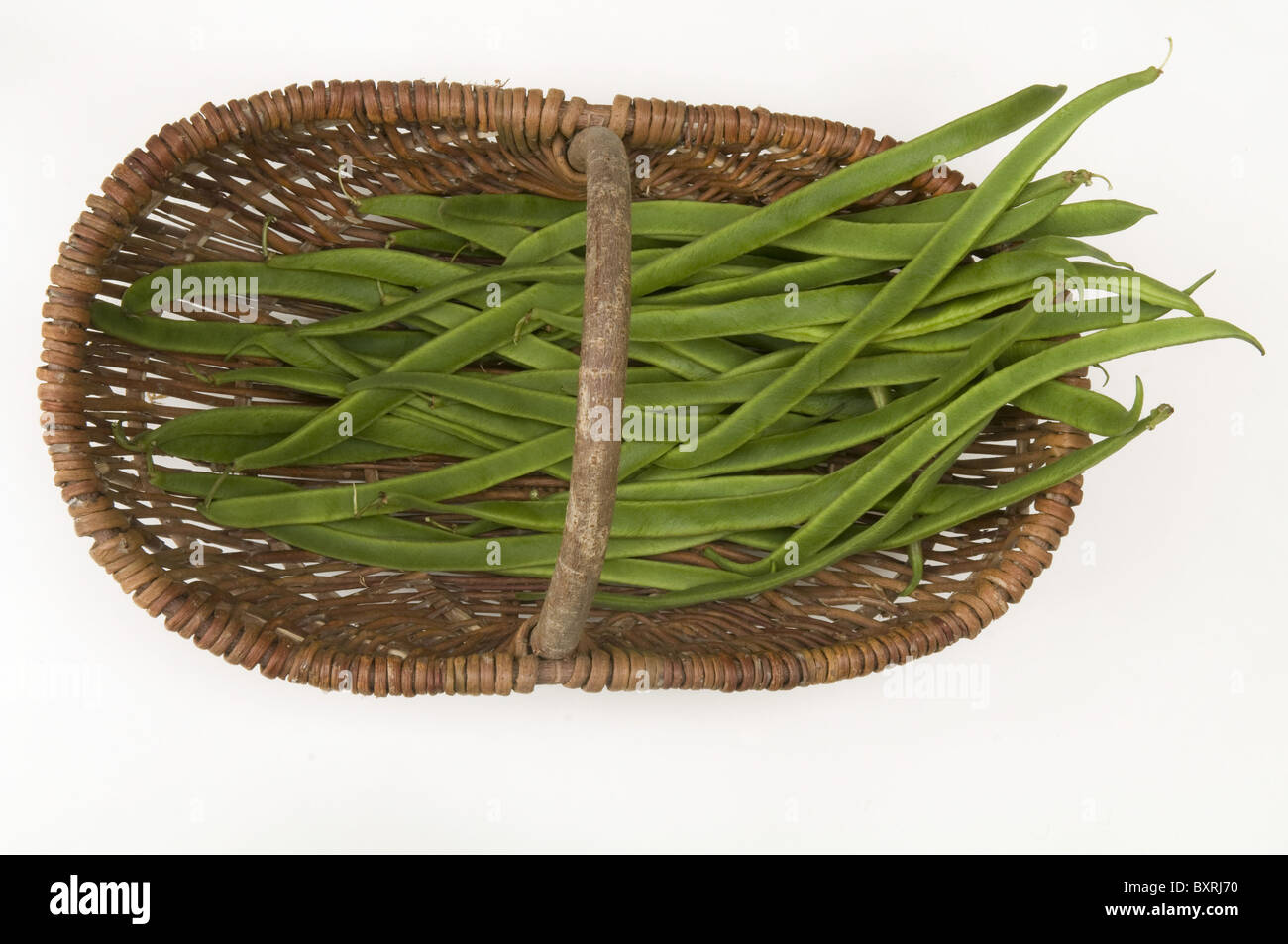Runner beans in wicker basket Stock Photo Alamy
