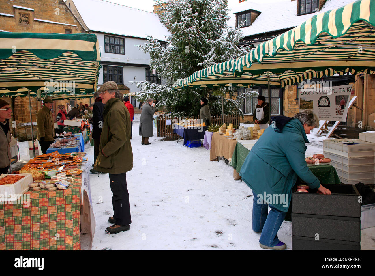 Snow covered market Square on Farmers day in Sherborne Dorset Stock Photo