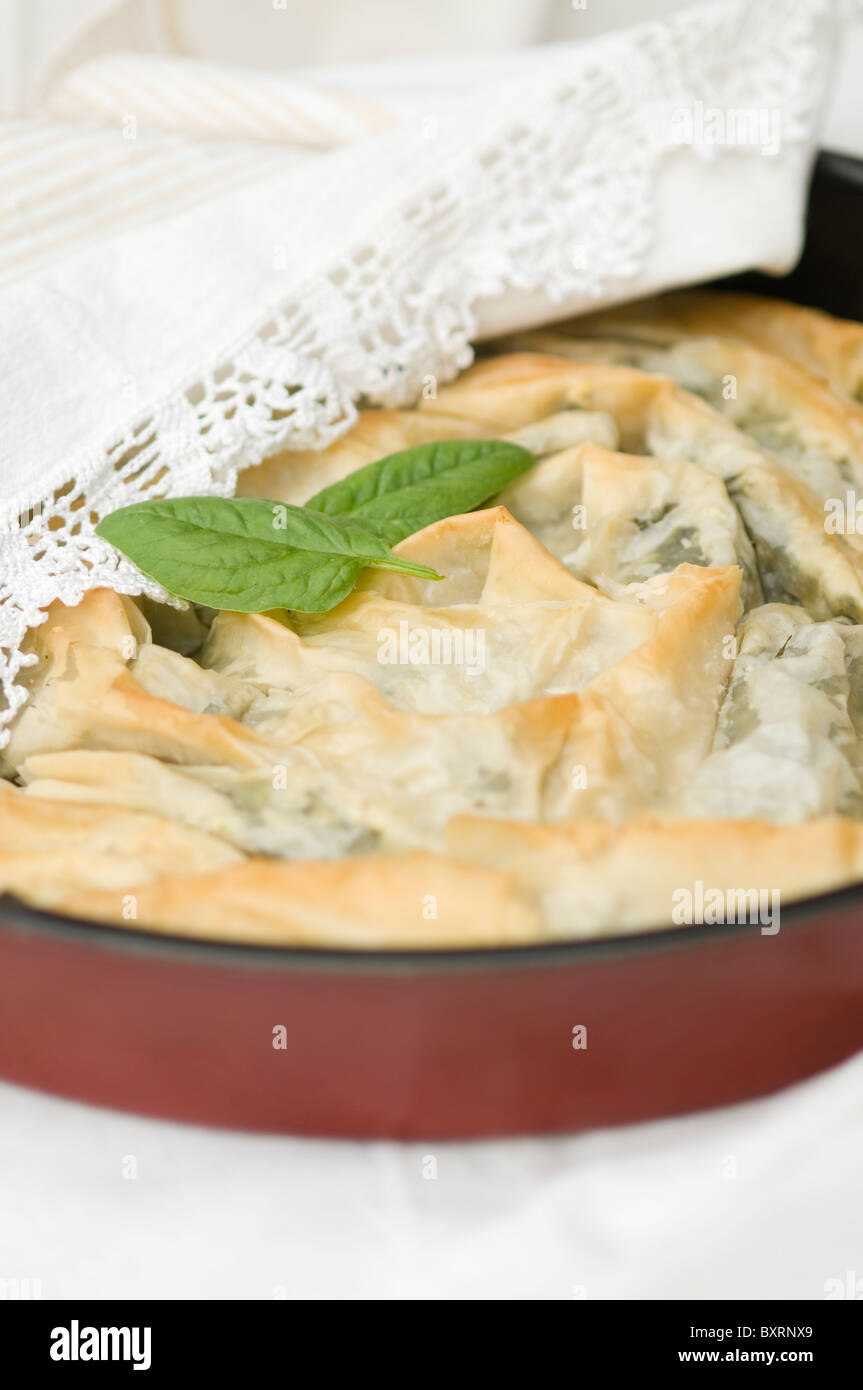 Traditional bulgarian spinach banitsa made of filo dough kori Stock