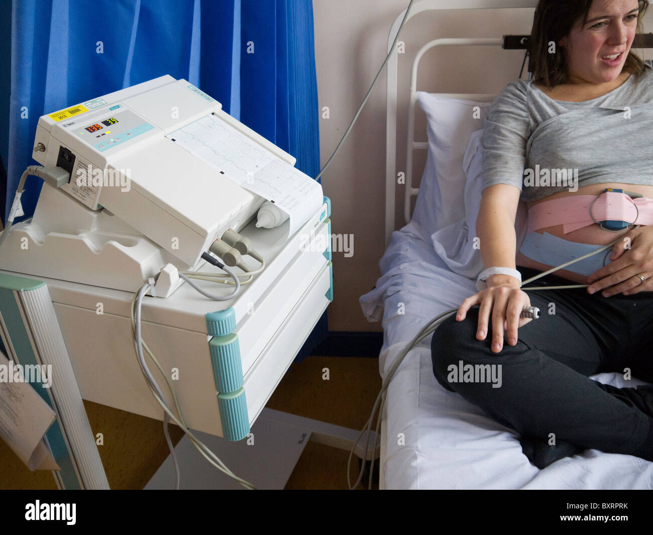 External fetal heart monitoring is performed by attaching external