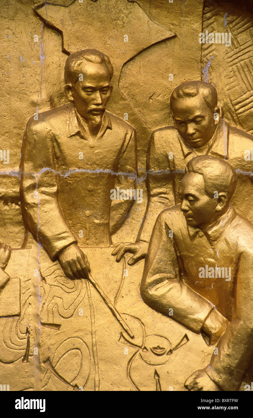 Reliefs with  the scenes from the Battle of Dien Bien Phu at war cemetery; Ho Chi Min and his generals planning the battle. Stock Photo