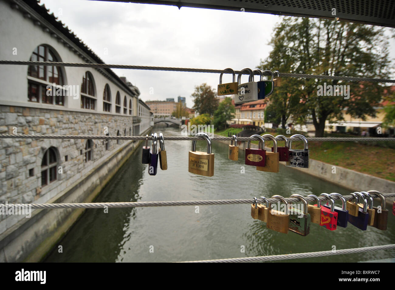 Padlocks on a bridge as a symbol of love Stock Photo Alamy