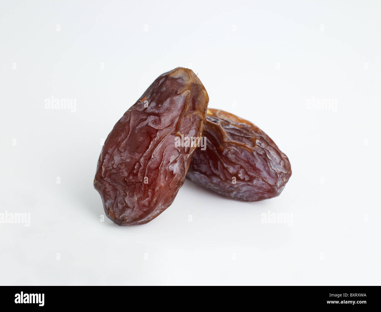 Medjool Dates on white background Stock Photo Alamy