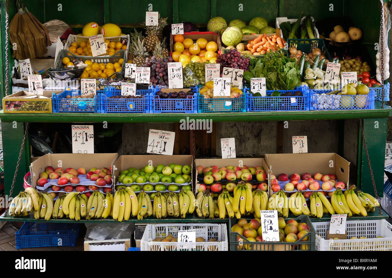 Market Stall selling Fresh Fruit and Vegetables , outdoors in Bournemouth, UK Stock Photo