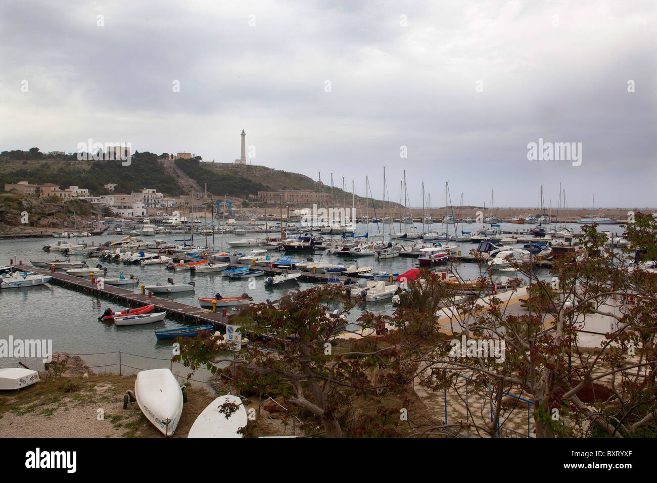 Port and lighthouse in background, Santa Maria di Leuca, Puglia, Italy Stock Photo