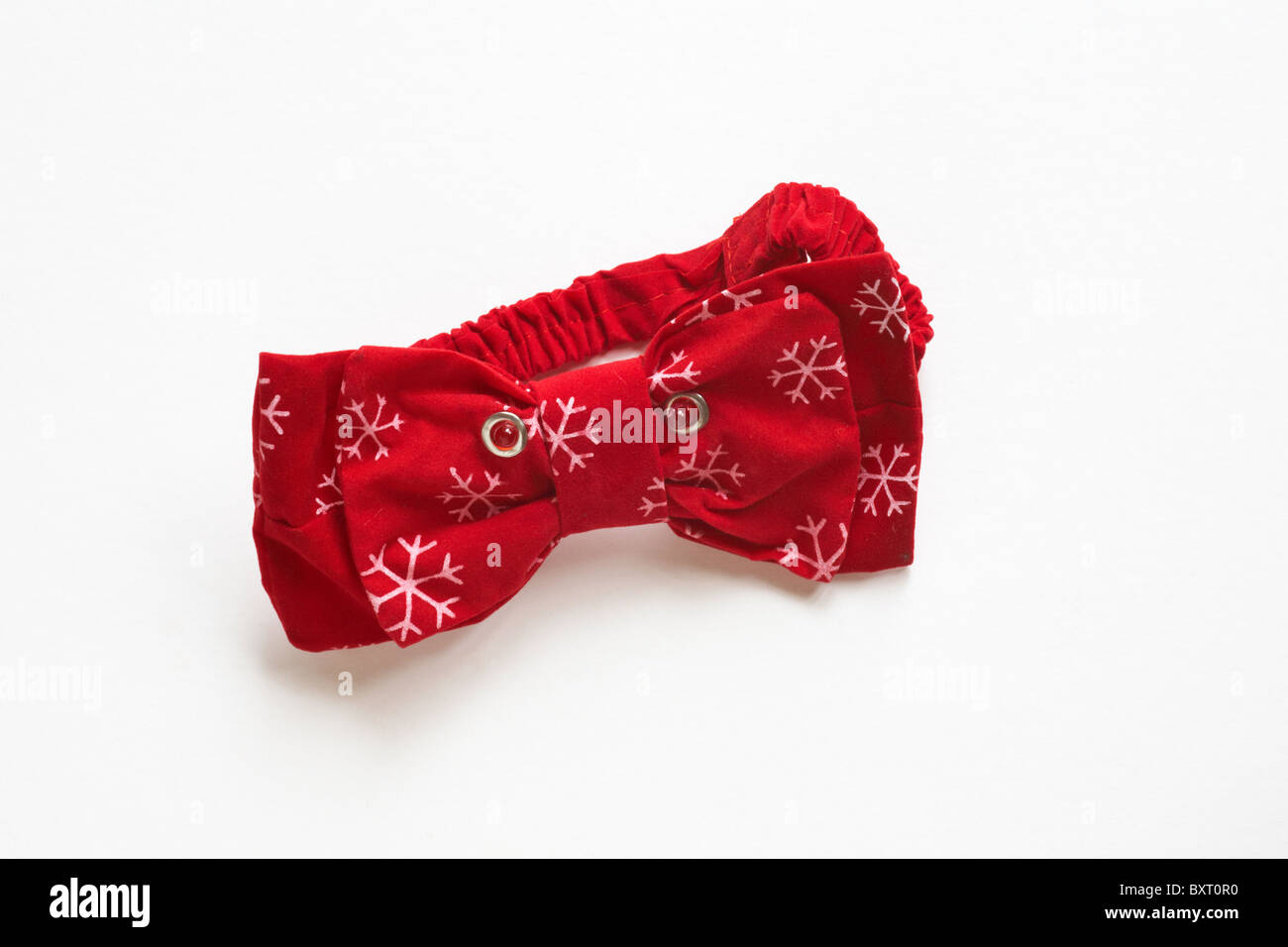 Novelty Christmas bow tie with flashing lights isolated on white background Stock Photo