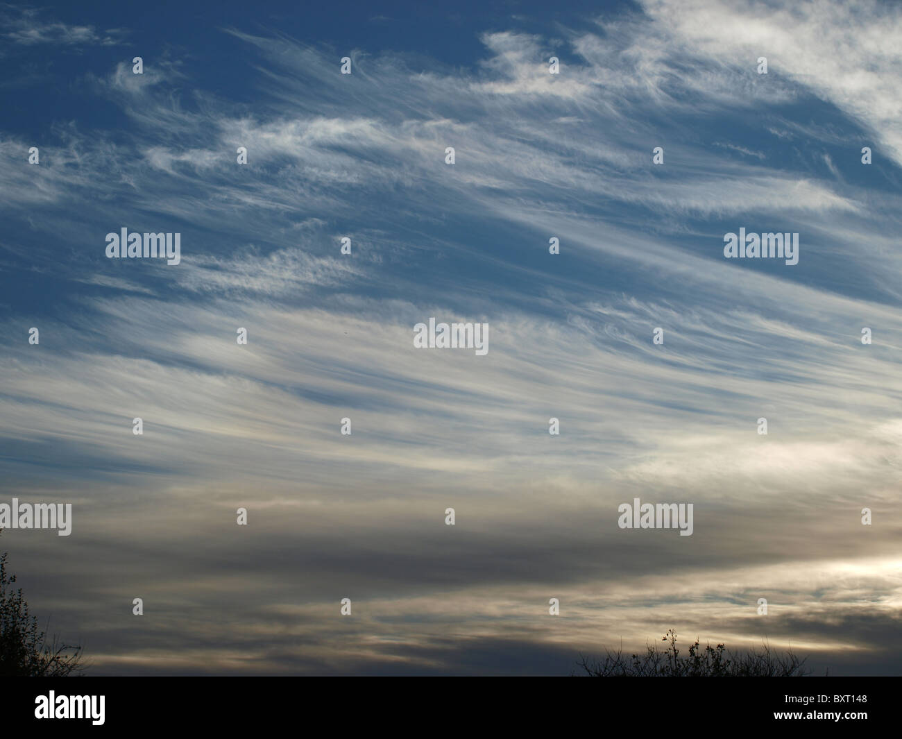 wintery cloud formations with mystical tendences,and dark moods below Stock Photo