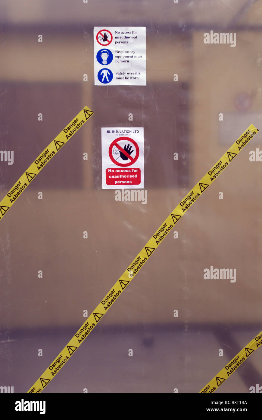 Protective plastic sheeting at asbestos removal Stock Photo