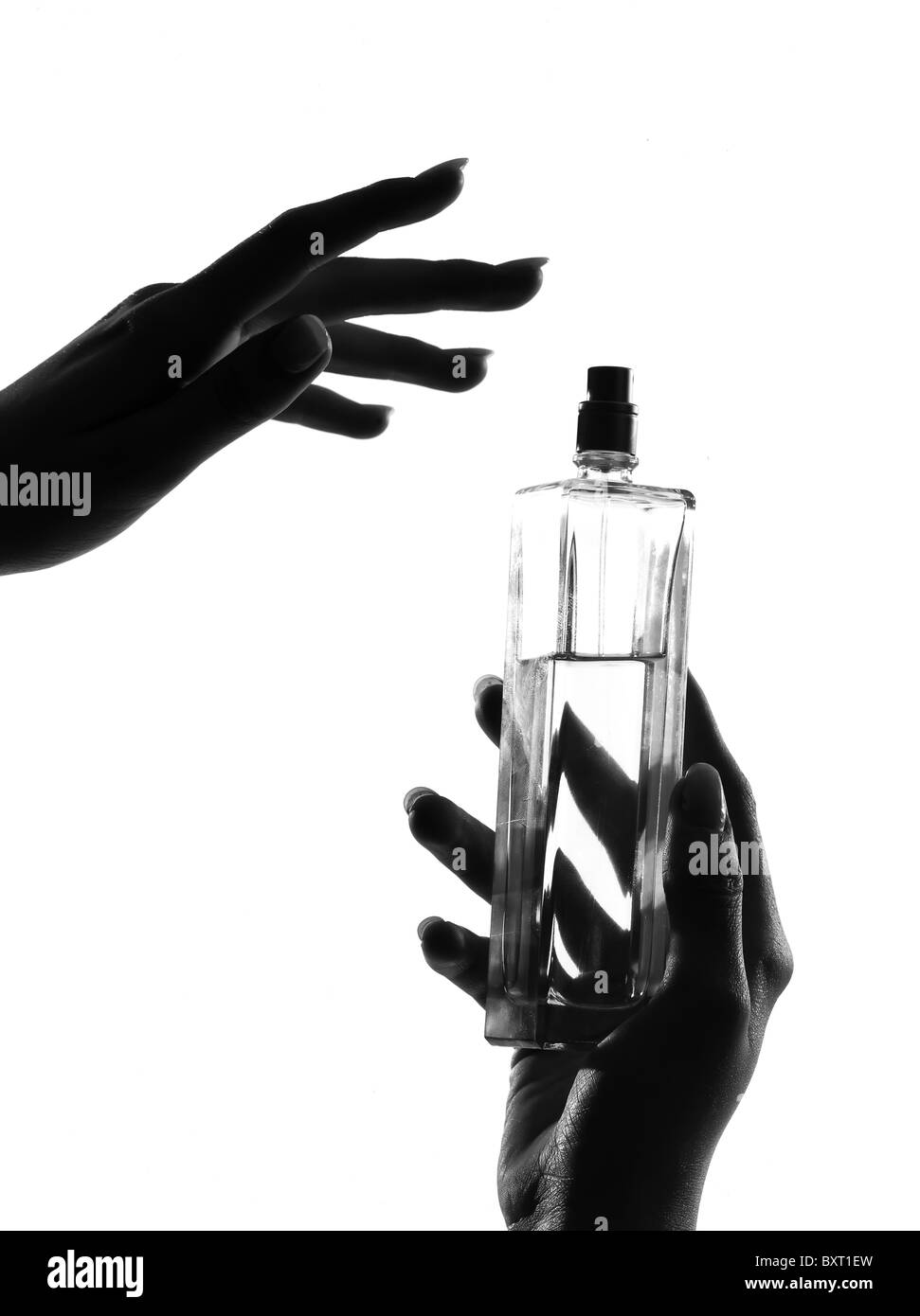 woman hands spraying perfume Stock Photo - Alamy