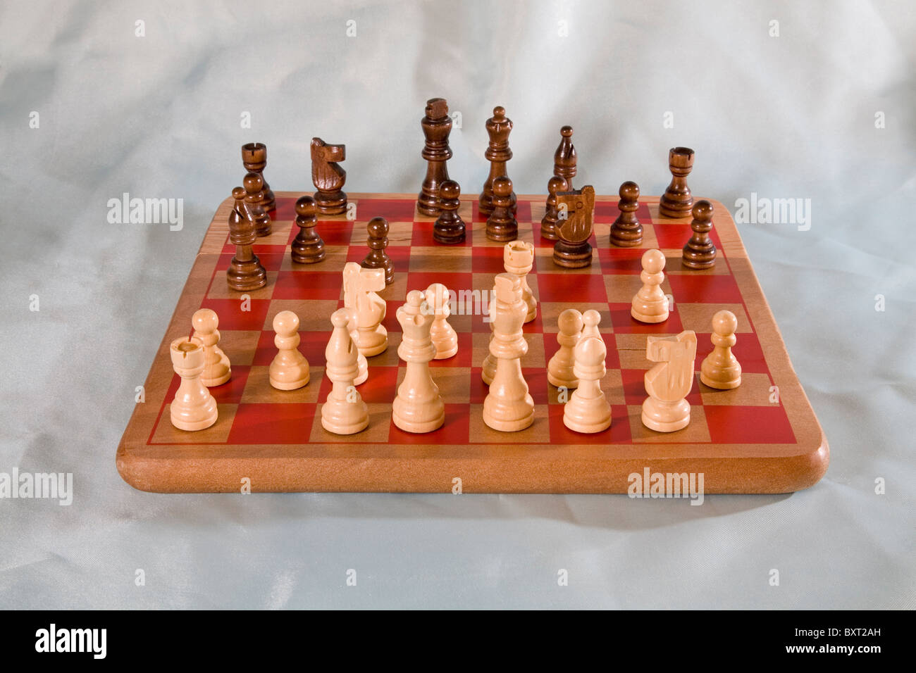 A chess board with chessmen placed in the starting position. Stock Photo
