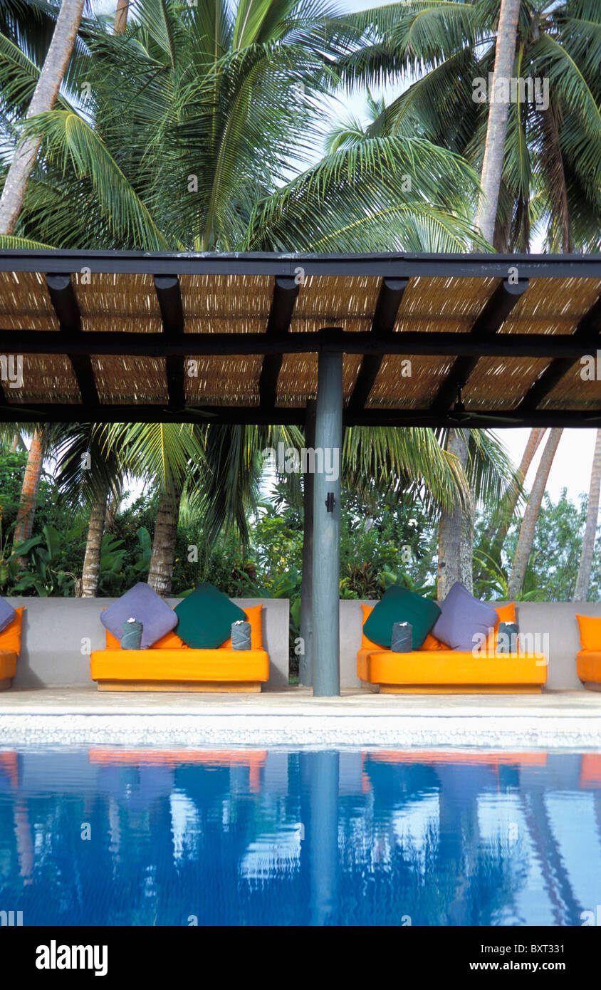 Padded Loungers By Pool Stock Photo