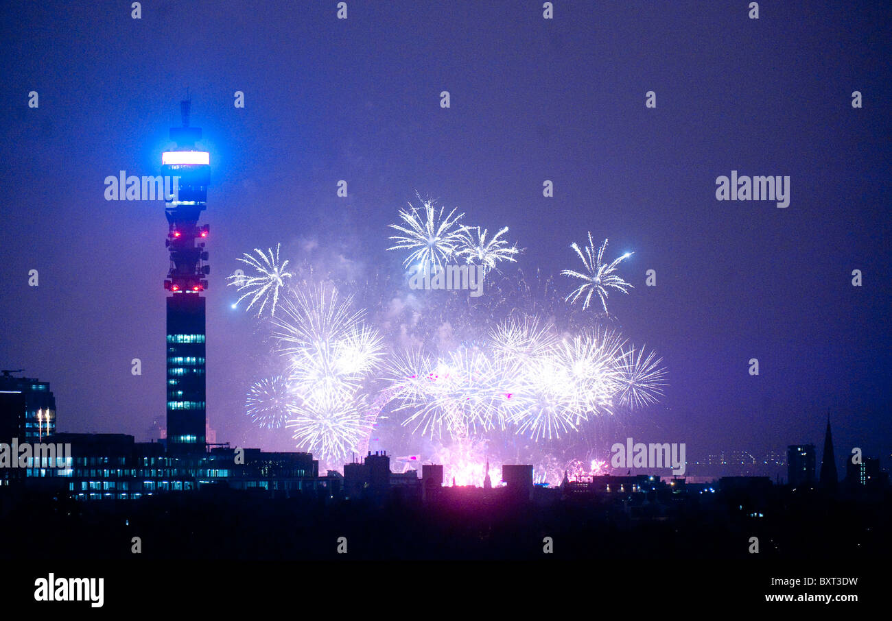 New Year's Eve London fireworks seen from Primrose Hill London with Telecom tower in foreground Stock Photo