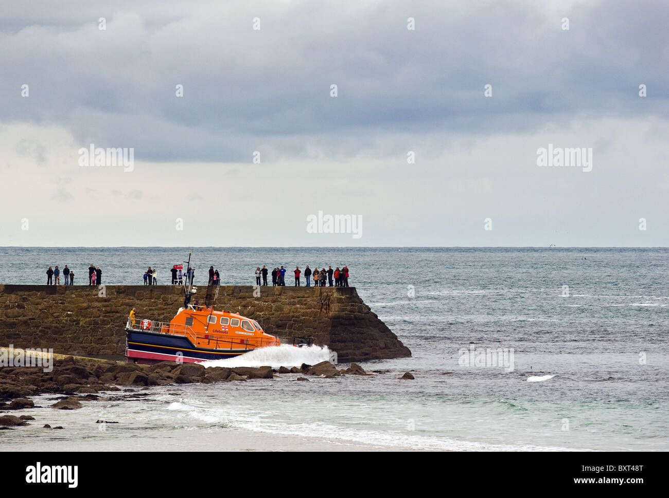 The RNLI lifeboat City of London III being launched at Sennen in Cornwall. Stock Photo