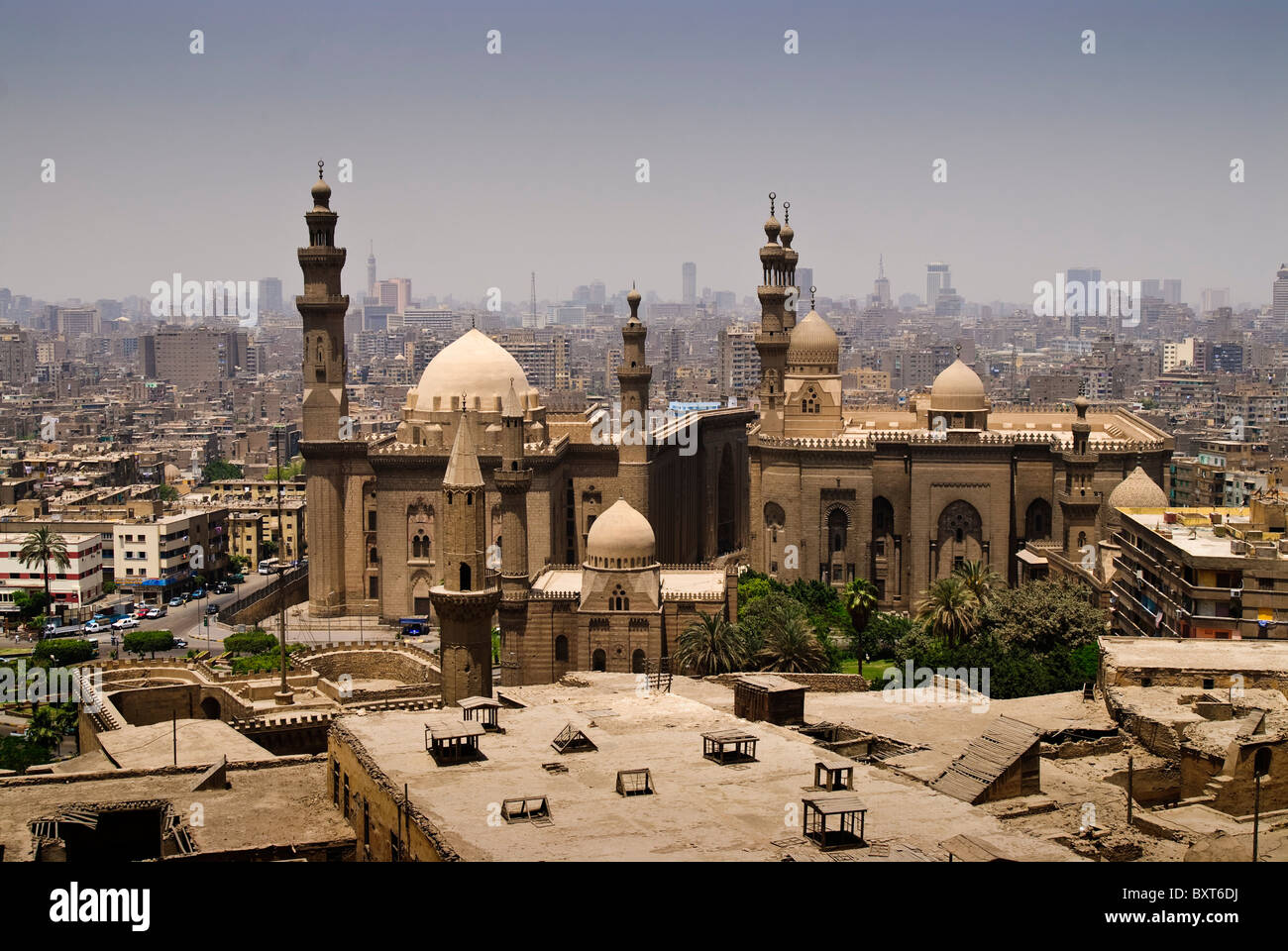 Sultan Hassan (left) and the later Al-Rifa'i mosques, as seen from The Citadel in Cairo Egypt. Stock Photo