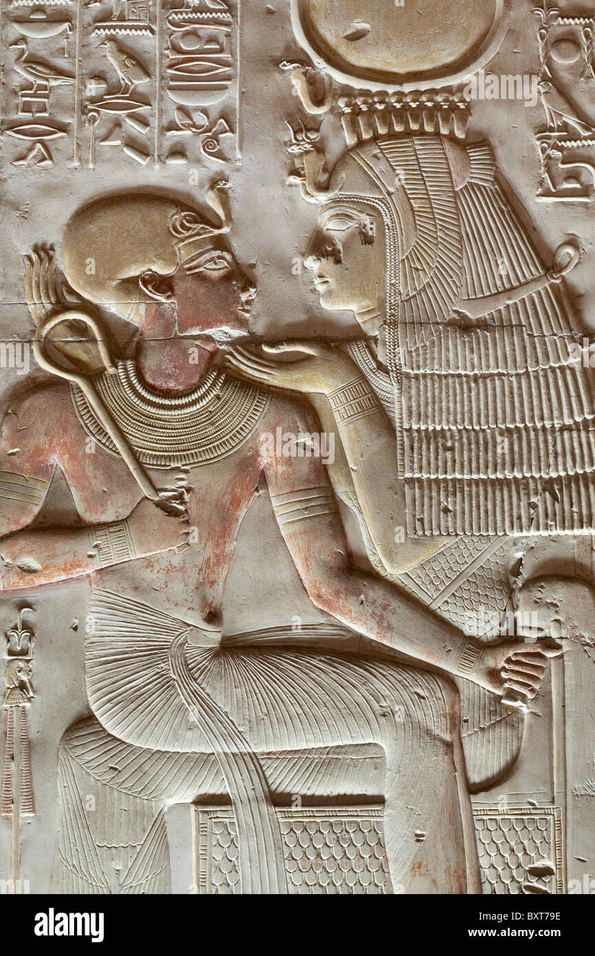 Relief of a young Seti with Isis in  the Temple of Seti I at Abydos, ancient Abdju, Nile Valley Egypt Stock Photo