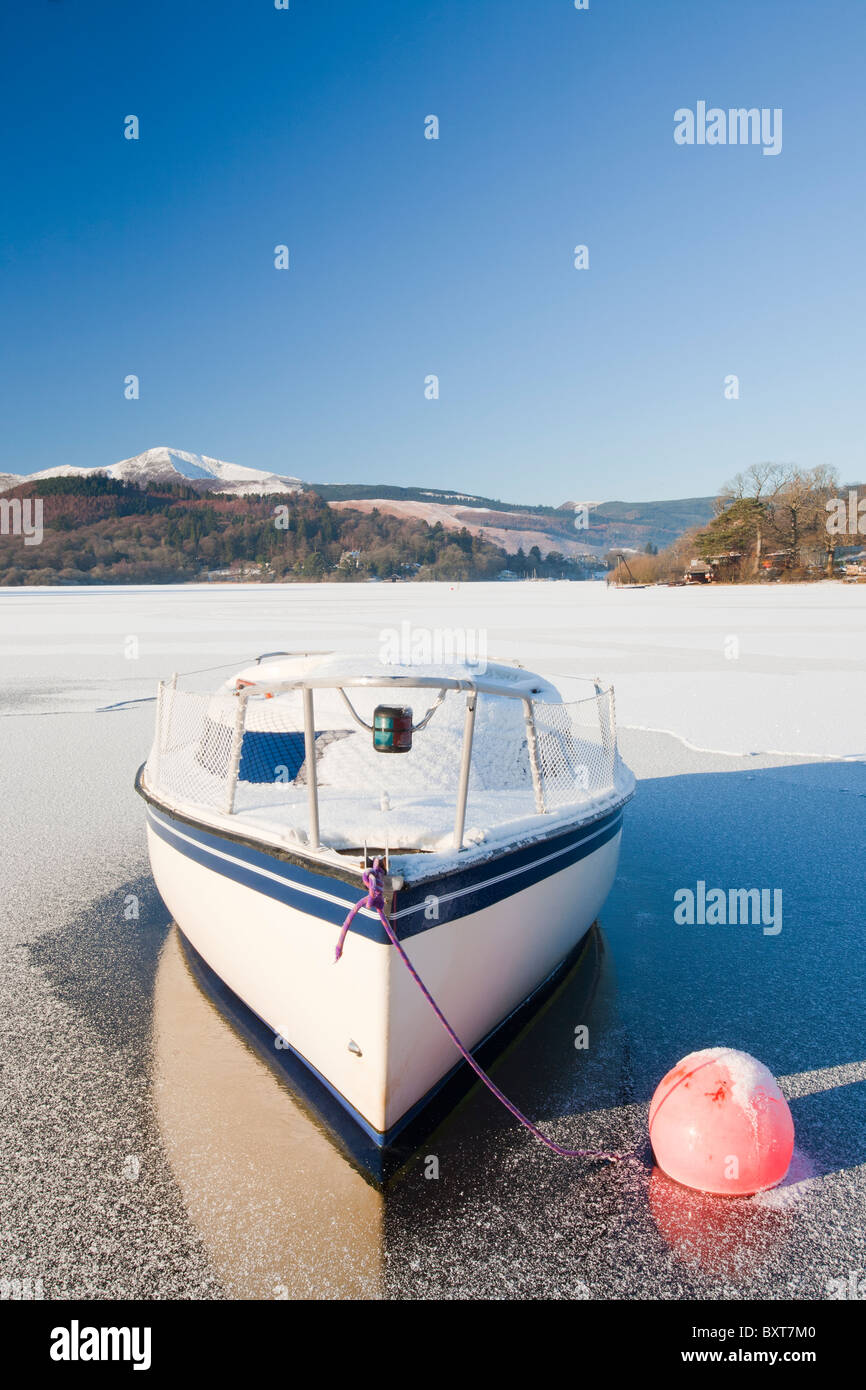 A boat locked in the ice on Derwent Water at Keswick in the Lake ...