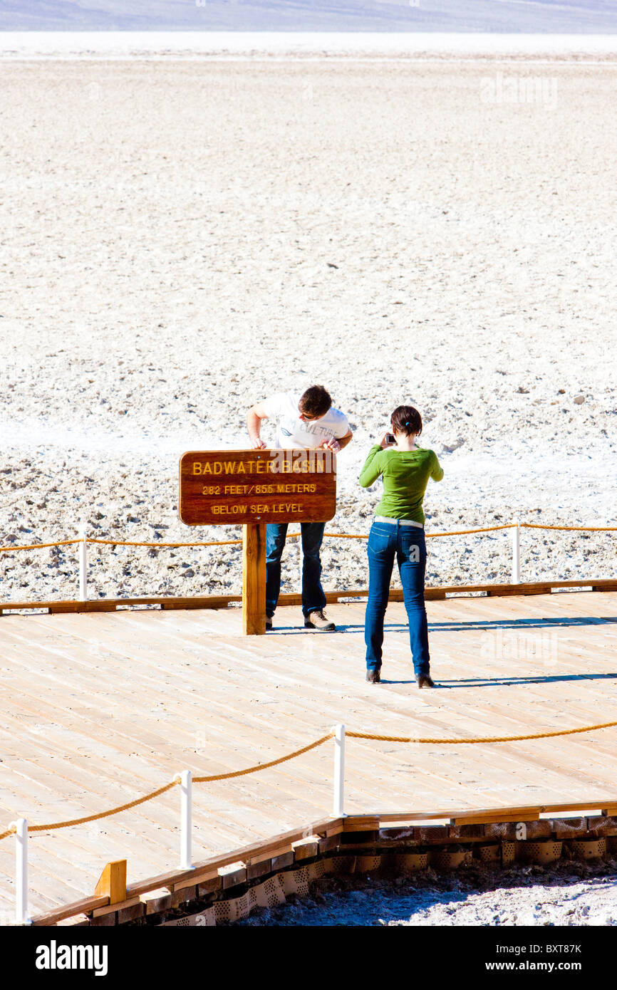 tourists in Badwater (the lowest point in North America), Death Valley ...