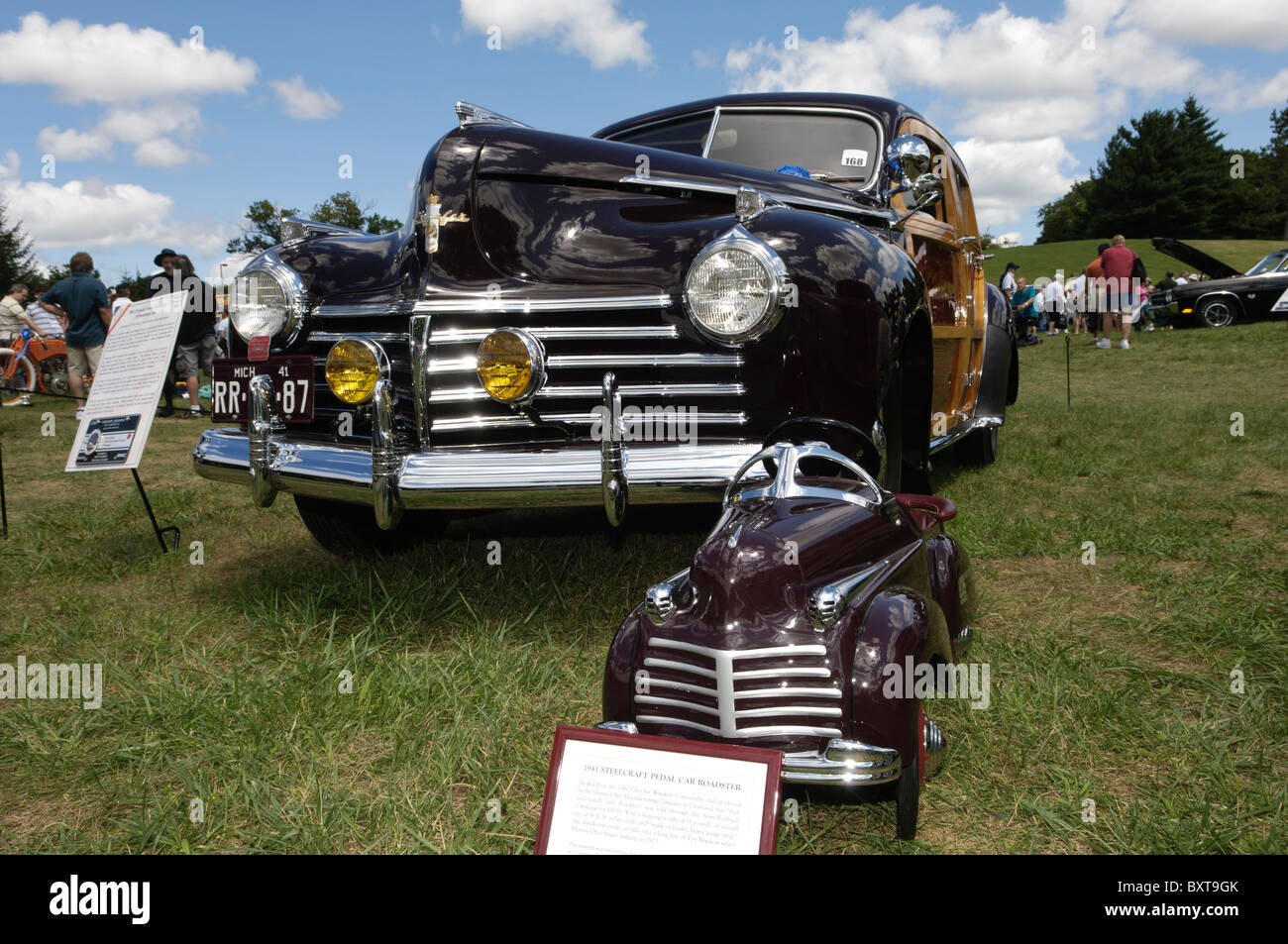 1941 Chrysler Town and Country 9 passenger car with a 1941 Steelcraft pedal car roadster Stock Photo