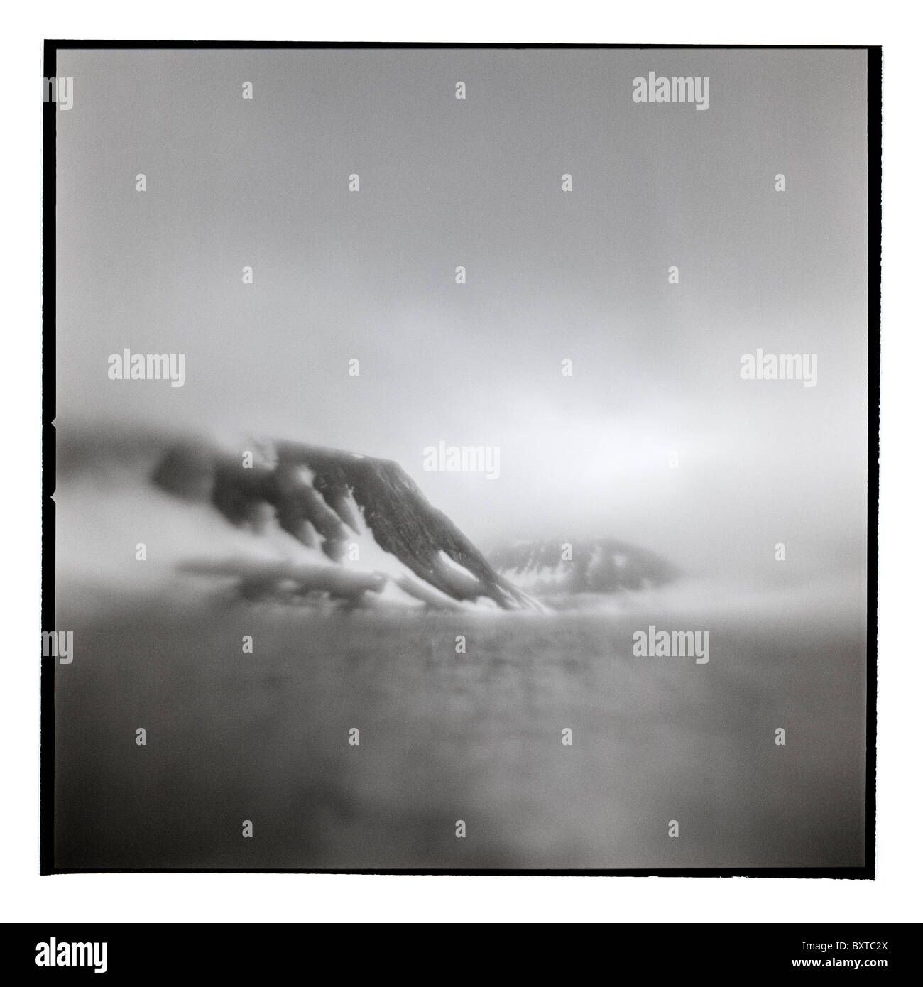 Norway, Svalbard, Blurred black and white image of distant mountains in Nordaustlandet Stock Photo