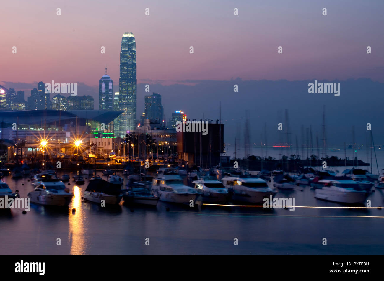Asia, China, Hong Kong, Harbour Skyline Ifc Tower Dusk Stock Photo