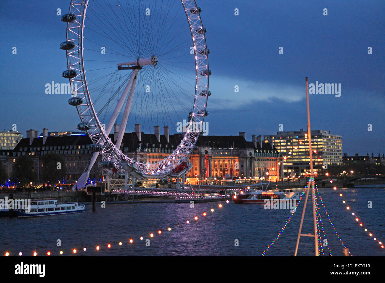 London, River Thames And London Eye On South Bank At Christmas Stock Photo