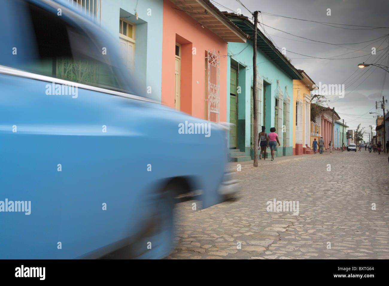TRINIDAD: CLASSIC CAR ON COLOURFUL COLONIAL STREET Stock Photo