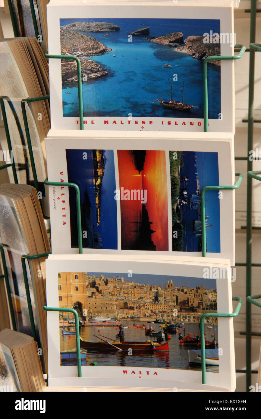 post cards of colourful fishing boats and buildings of malta from a suvenier shop,valetta,malta Stock Photo