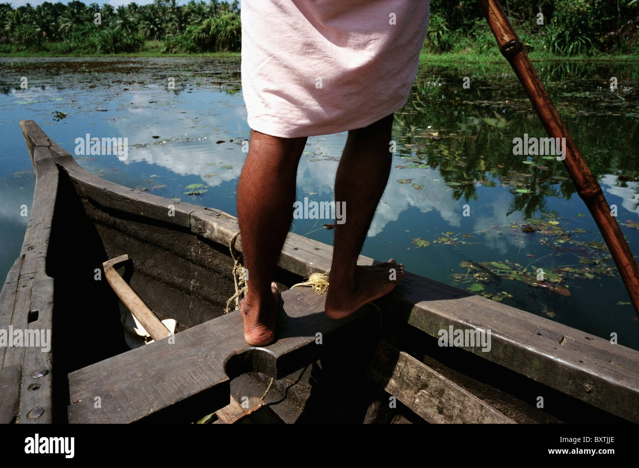 Man Rowing Along The Backwaters Stock Photo - Alamy