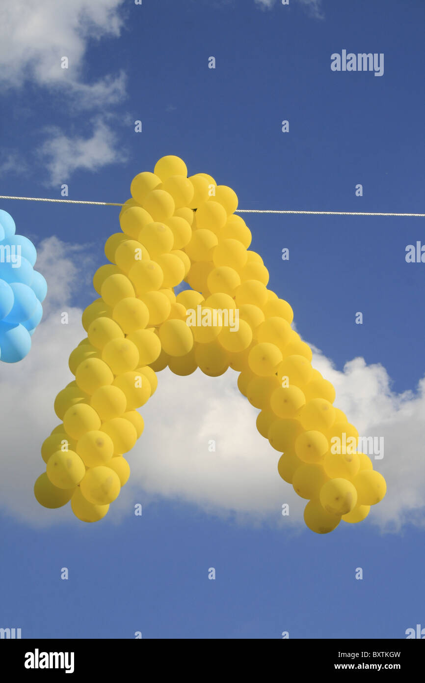yellow letter balloons