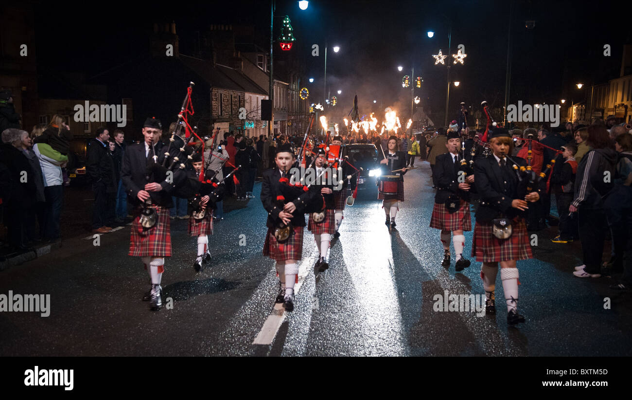 Torchlight parade in Biggar High Street in South Lanarkshire, Scotland