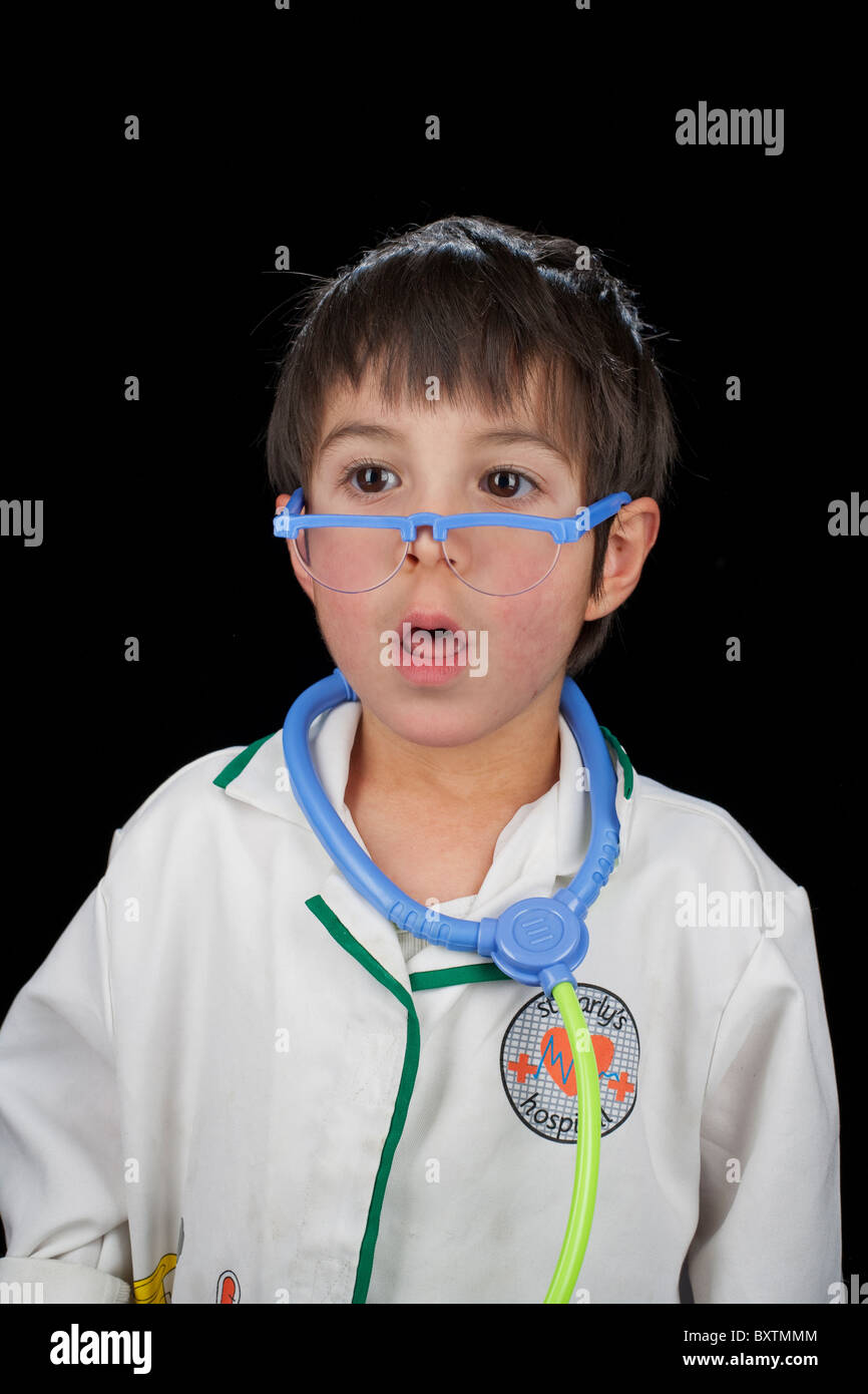 Portrait of 4 year old boy dressed as a doctor Stock Photo