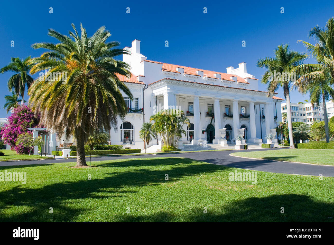 Whitehall built 1902 by Henry Flagler Museum , Palm Beach , Florida , USA , exterior frontage & gardens with palm trees Stock Photo