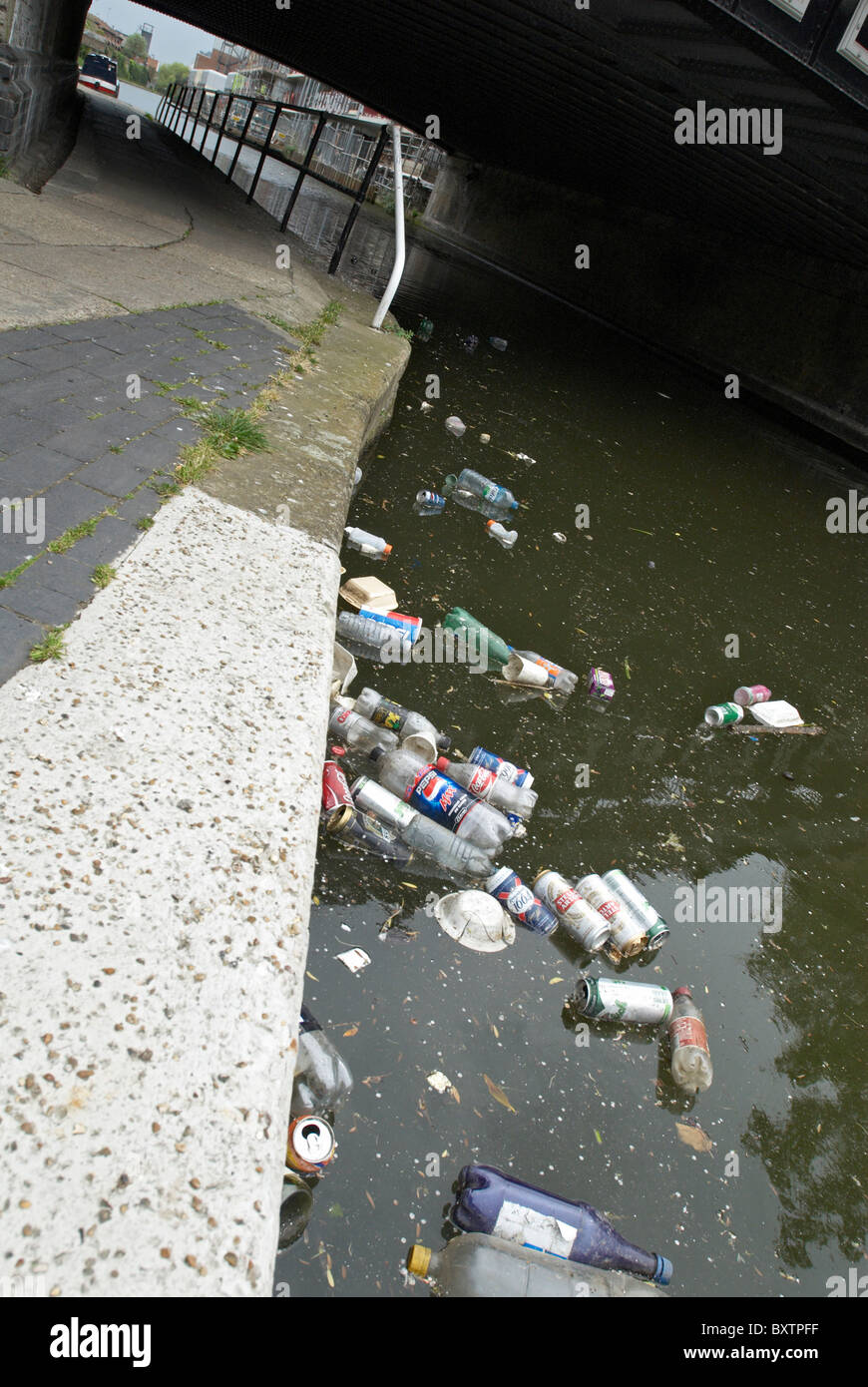 Litter in canal UK Stock Photo