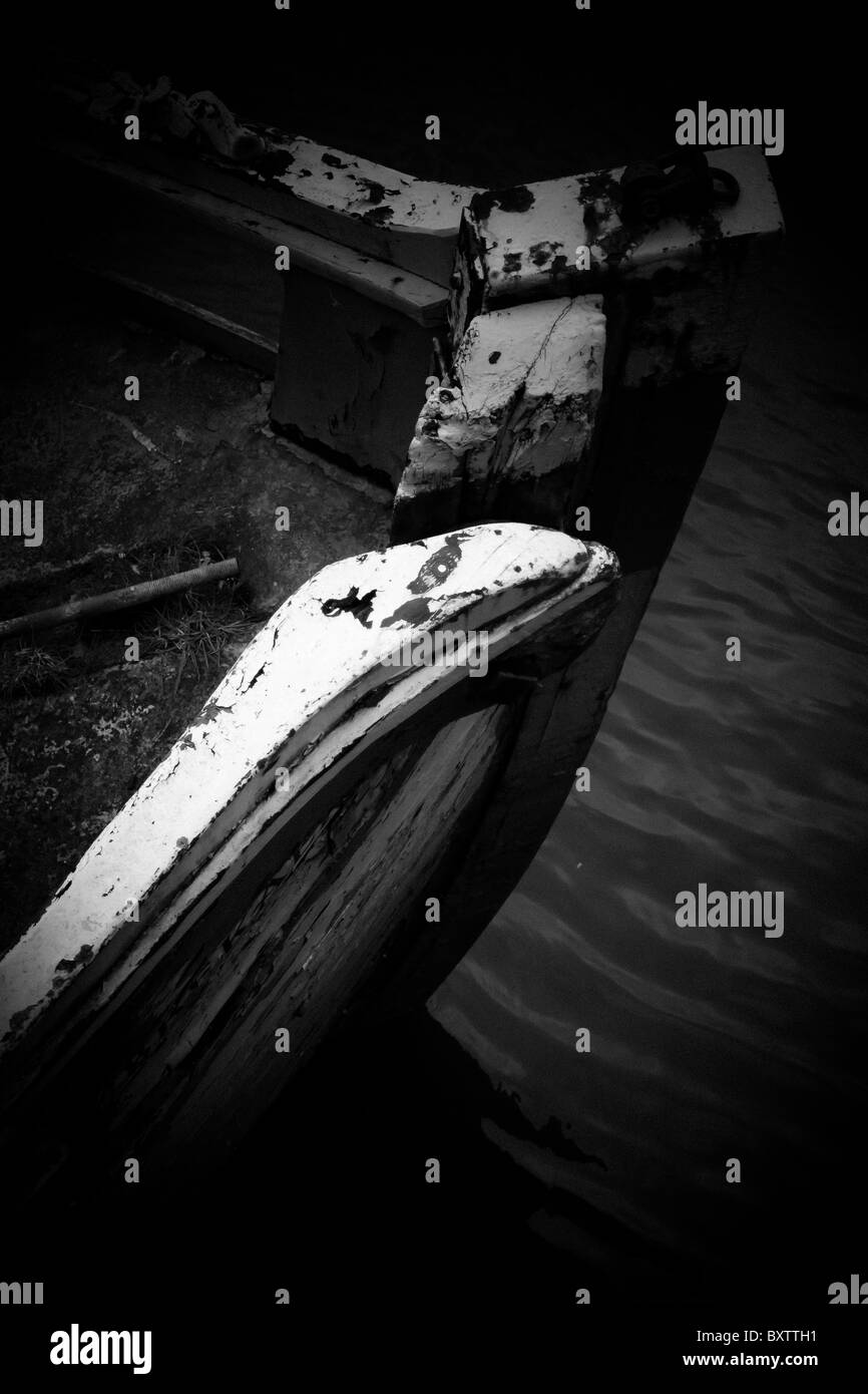 Brekaer Wreck of abandoned fishing boat on the river Tyne near scotswood bridge. Stock Photo