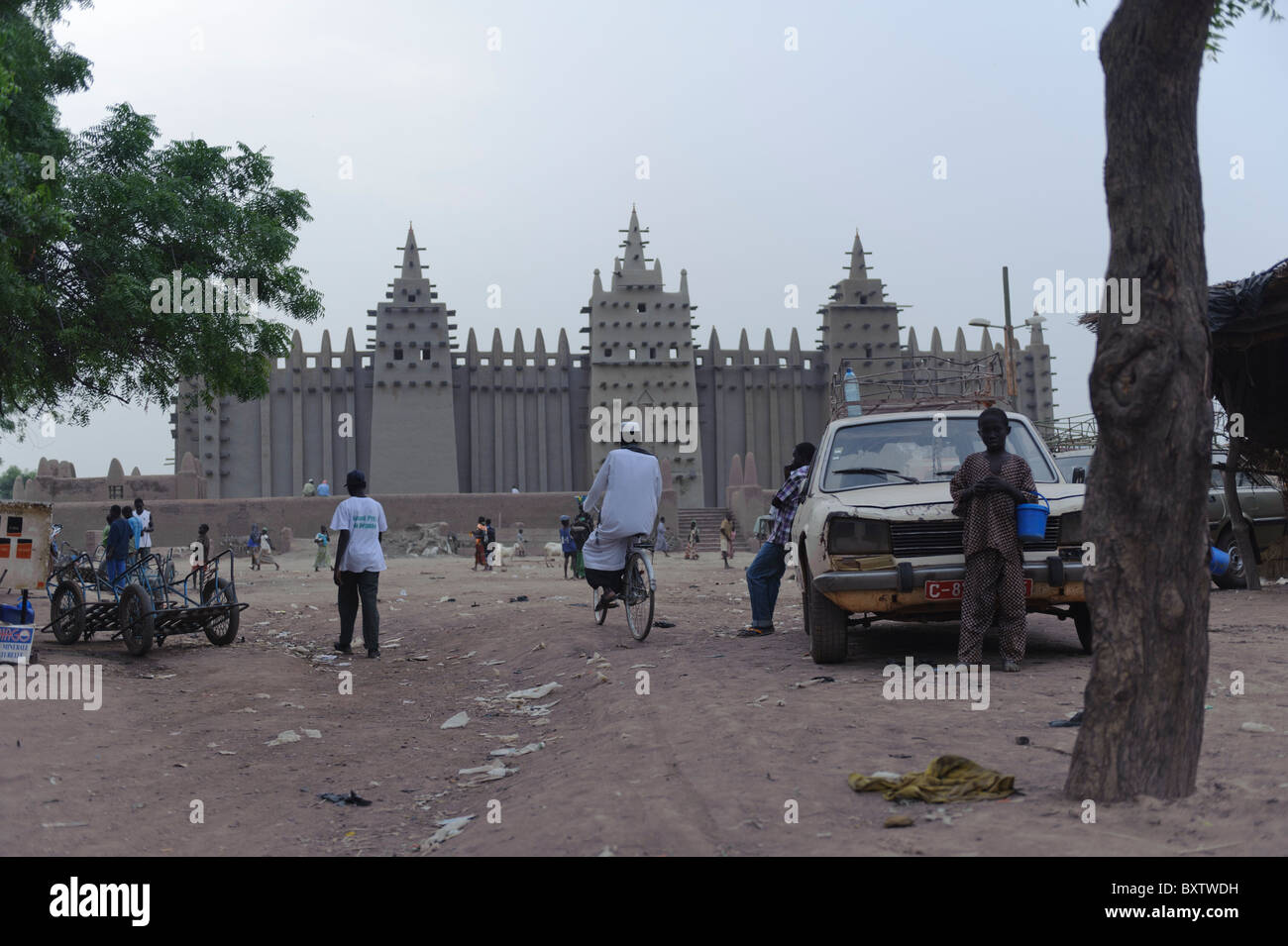 Street scene in front of the Great  Mosque of Djenné, Mali Stock Photo