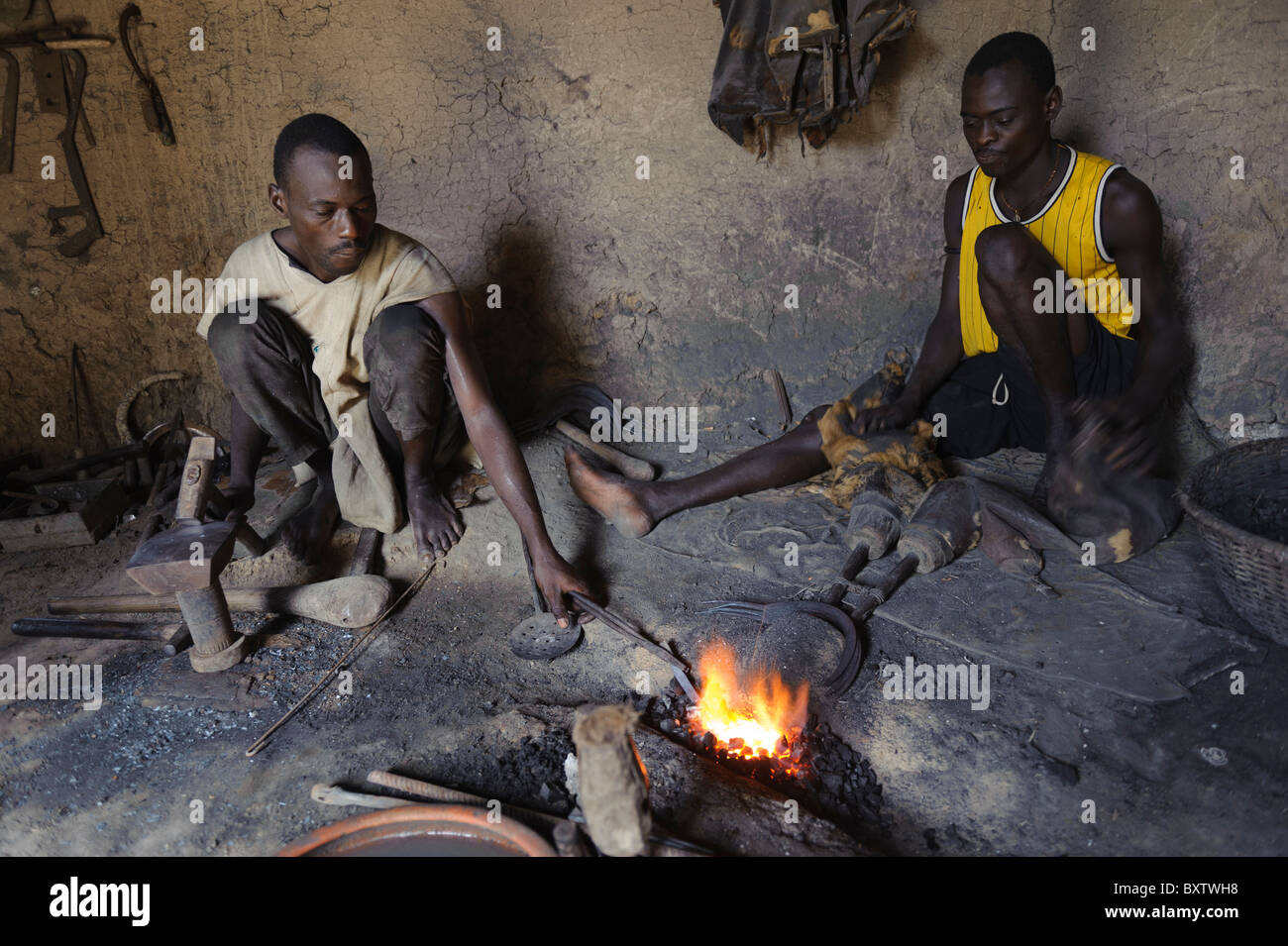 Local black smith in the Bozo village of Sirimou, near Djenné. Mali. Stock Photo
