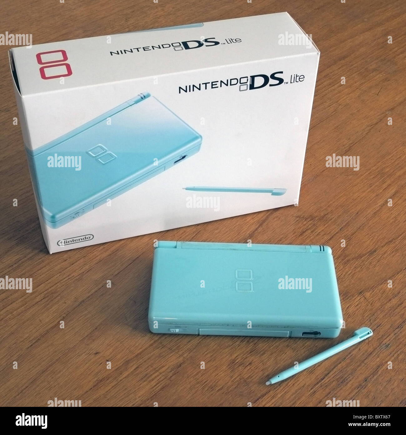 Nintendo DS Lite Handheld Games Console with box packaging, UK Stock Photo