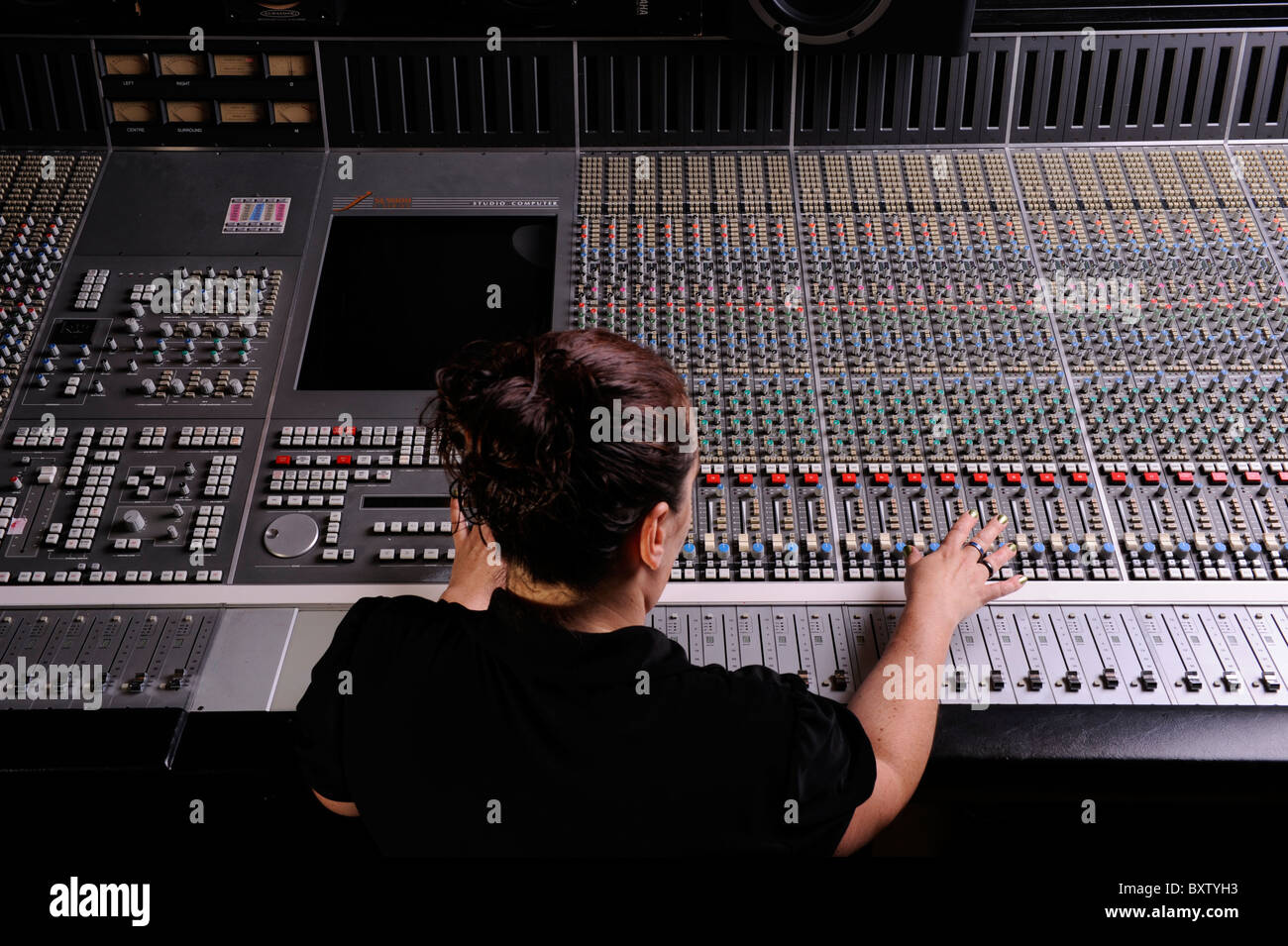 Large Mixing Desk In London Recording Studio With Sound Engineer