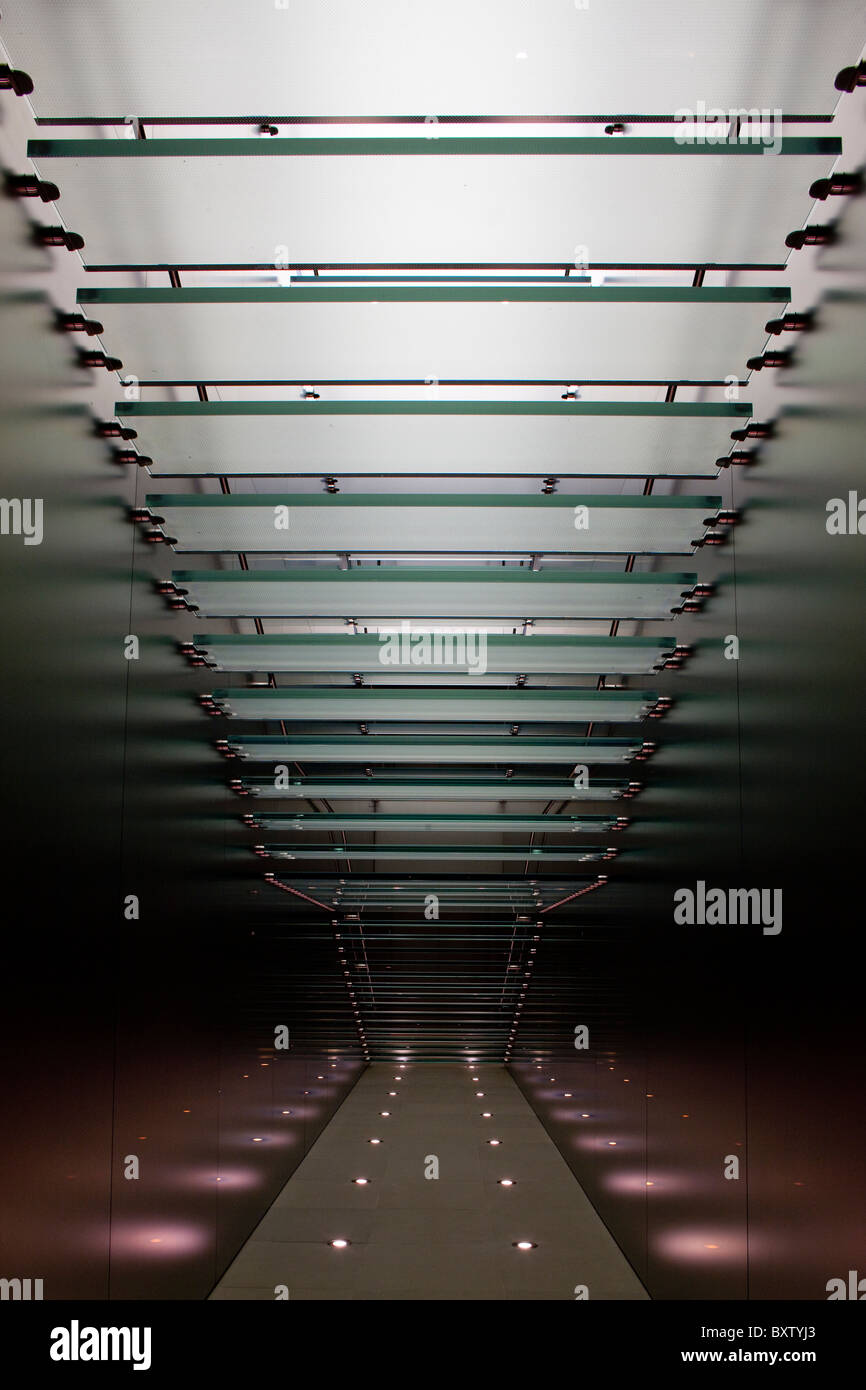 Australia, New South Wales, Sydney, View from underneath glass stairway inside Apple Store Stock Photo