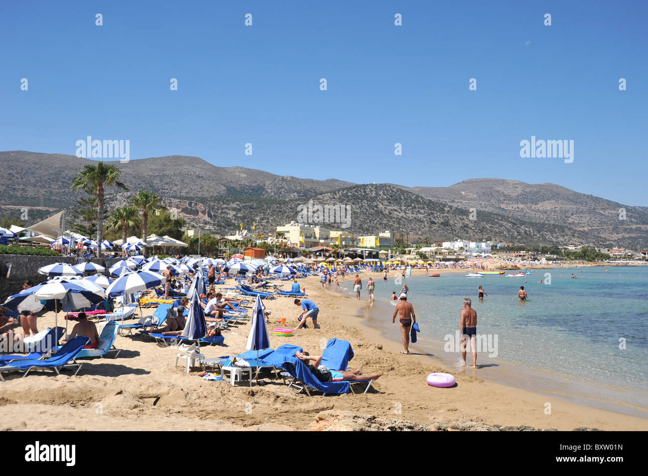 Wide sandy beach in Malia, Crete, Greece Stock Photo