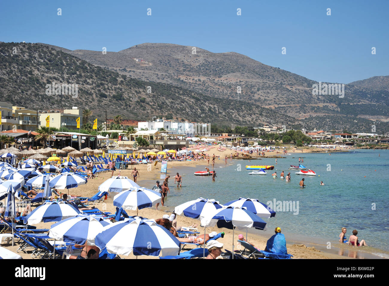 Wide sandy beach in Malia, Crete, Greece Stock Photo